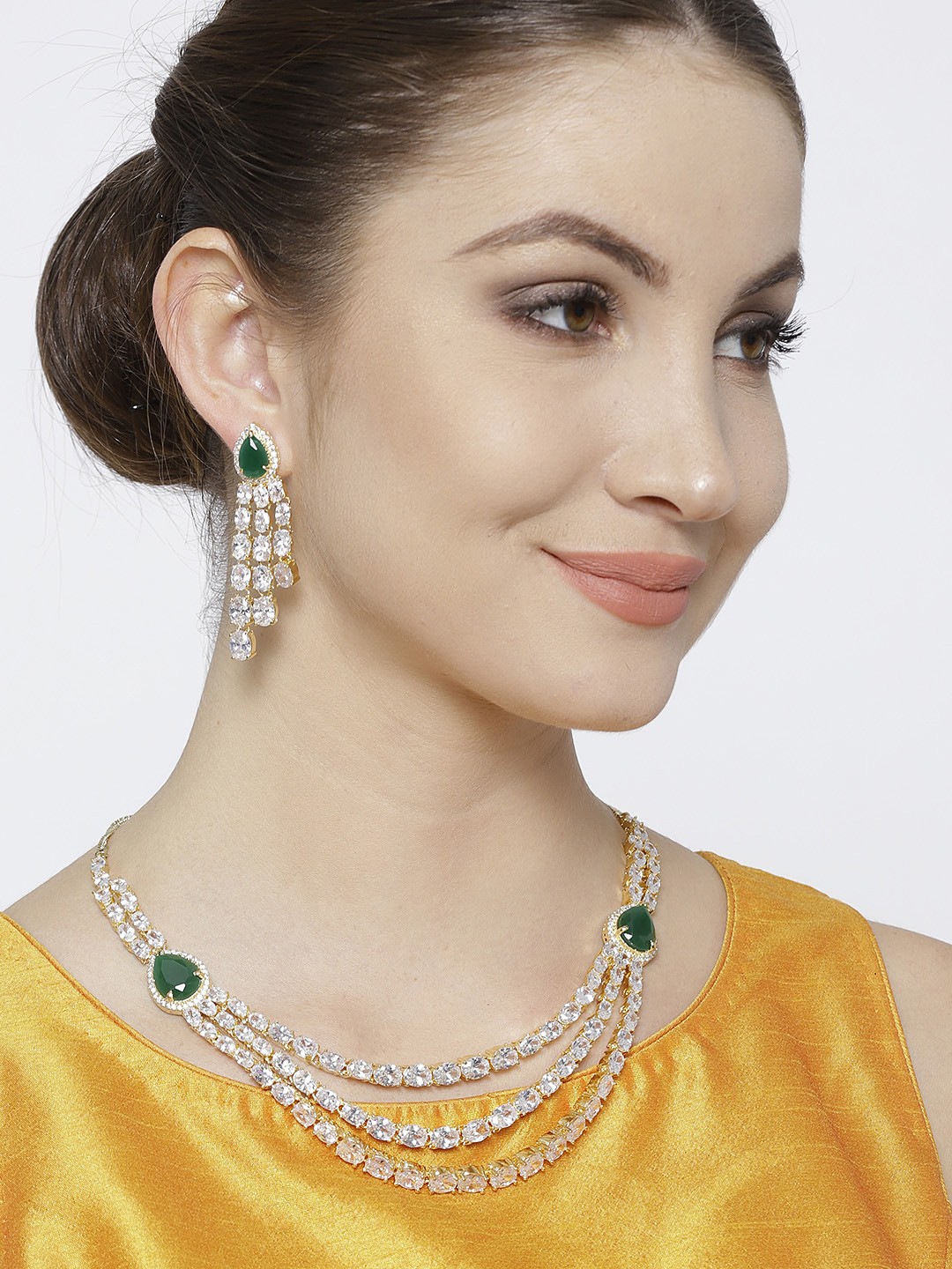 

Jewels Galaxy Gold-Toned & Green Stone-Studded Jewellery Set
