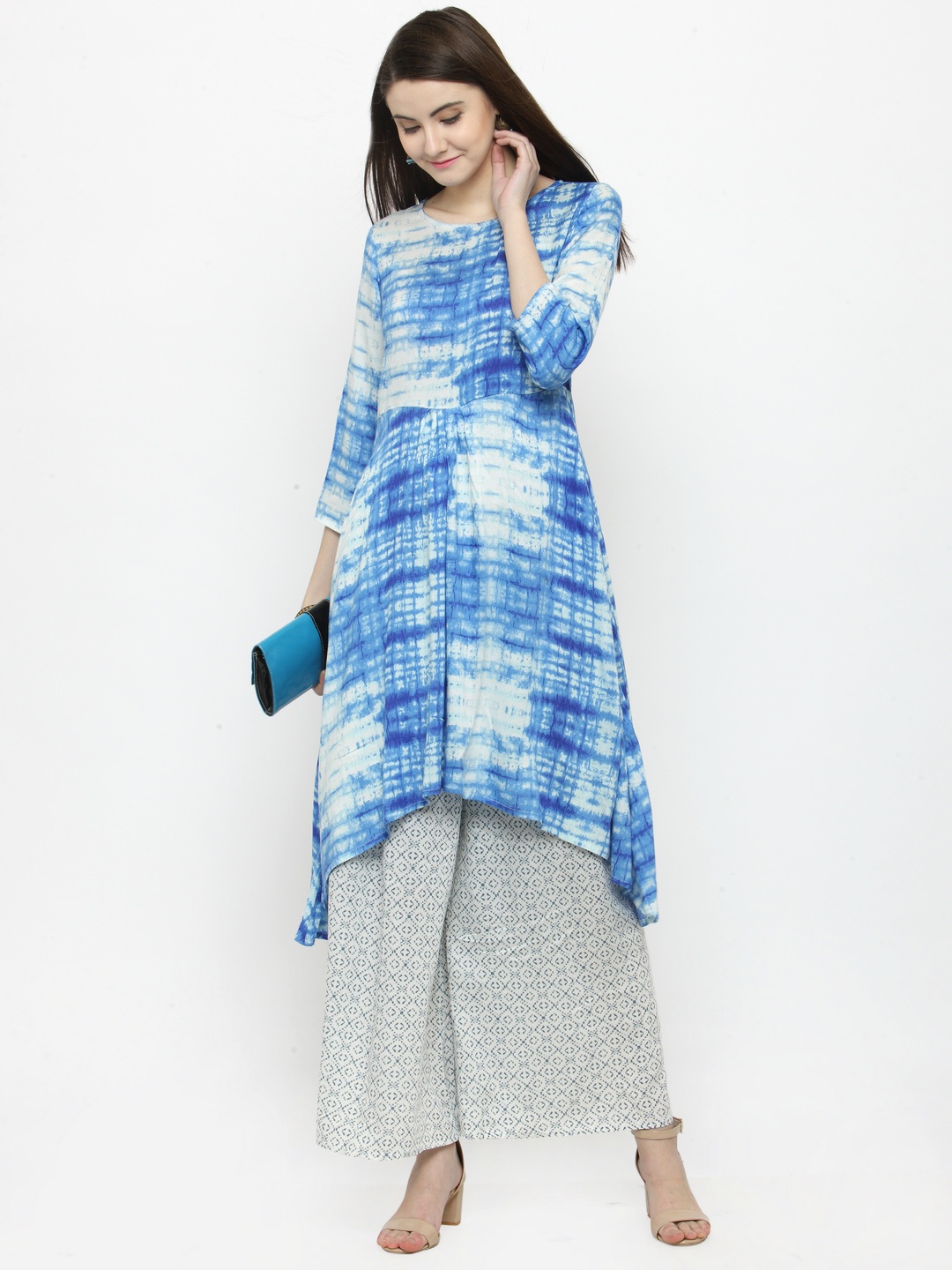 

Sera Women Blue & White Printed Kurta with Palazzos