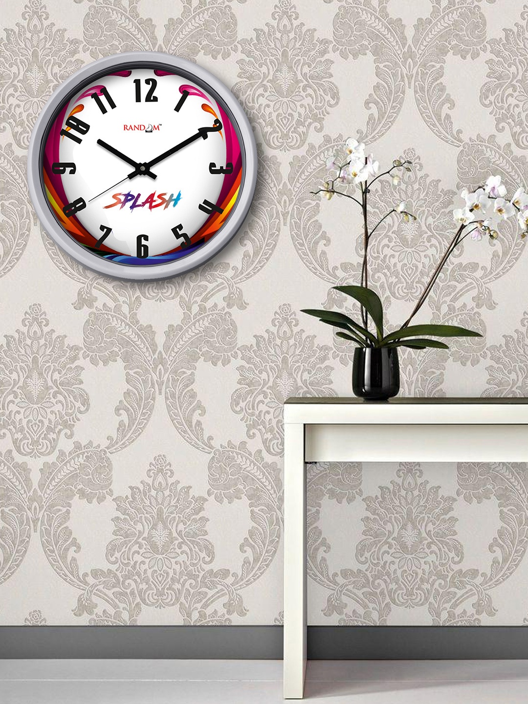 

RANDOM Multicoloured Round Colourblocked 30.48 cm Analogue Wall Clock, Multi