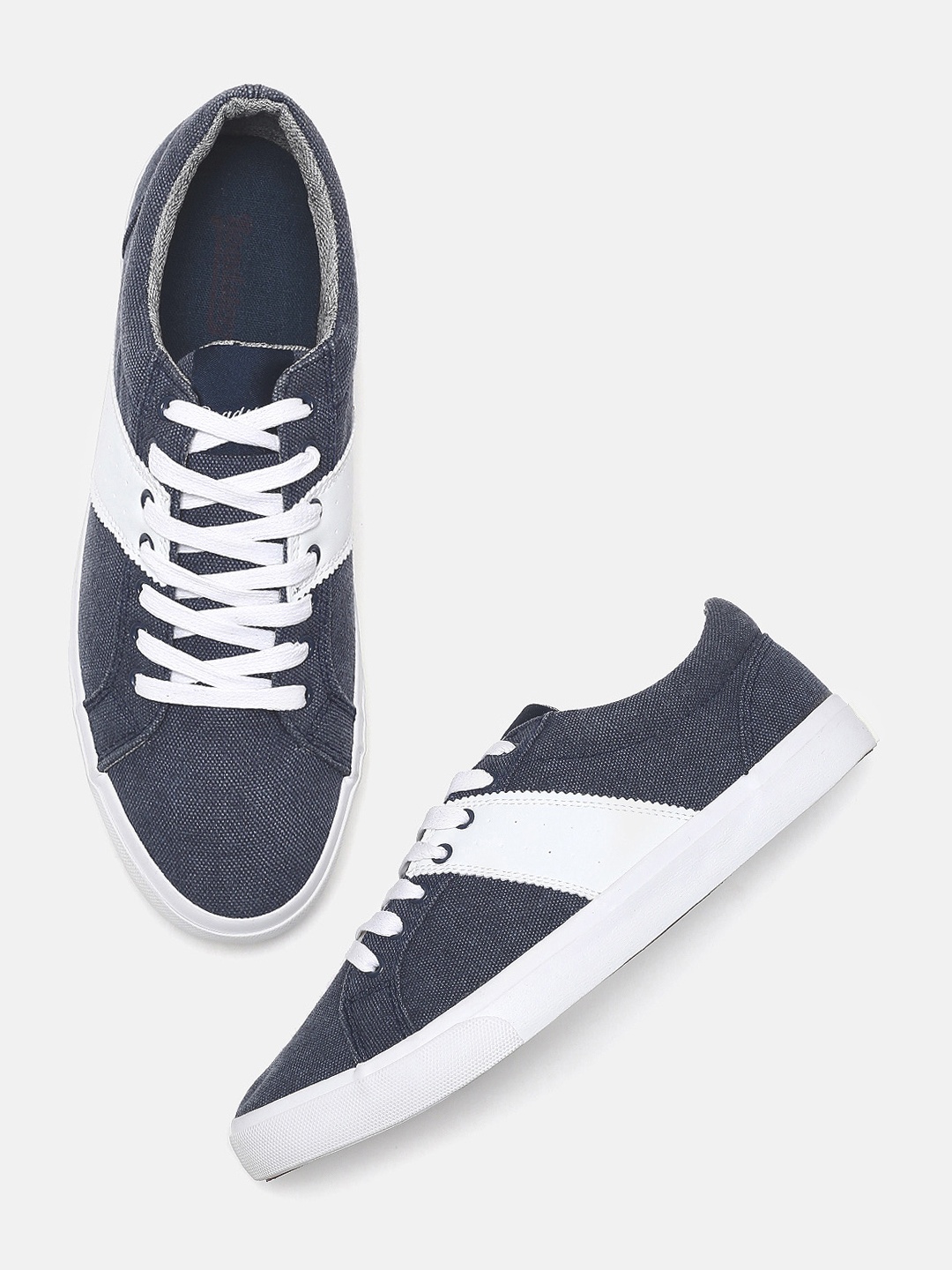 

Roadster Men Navy Blue & White Colourblocked Sneakers