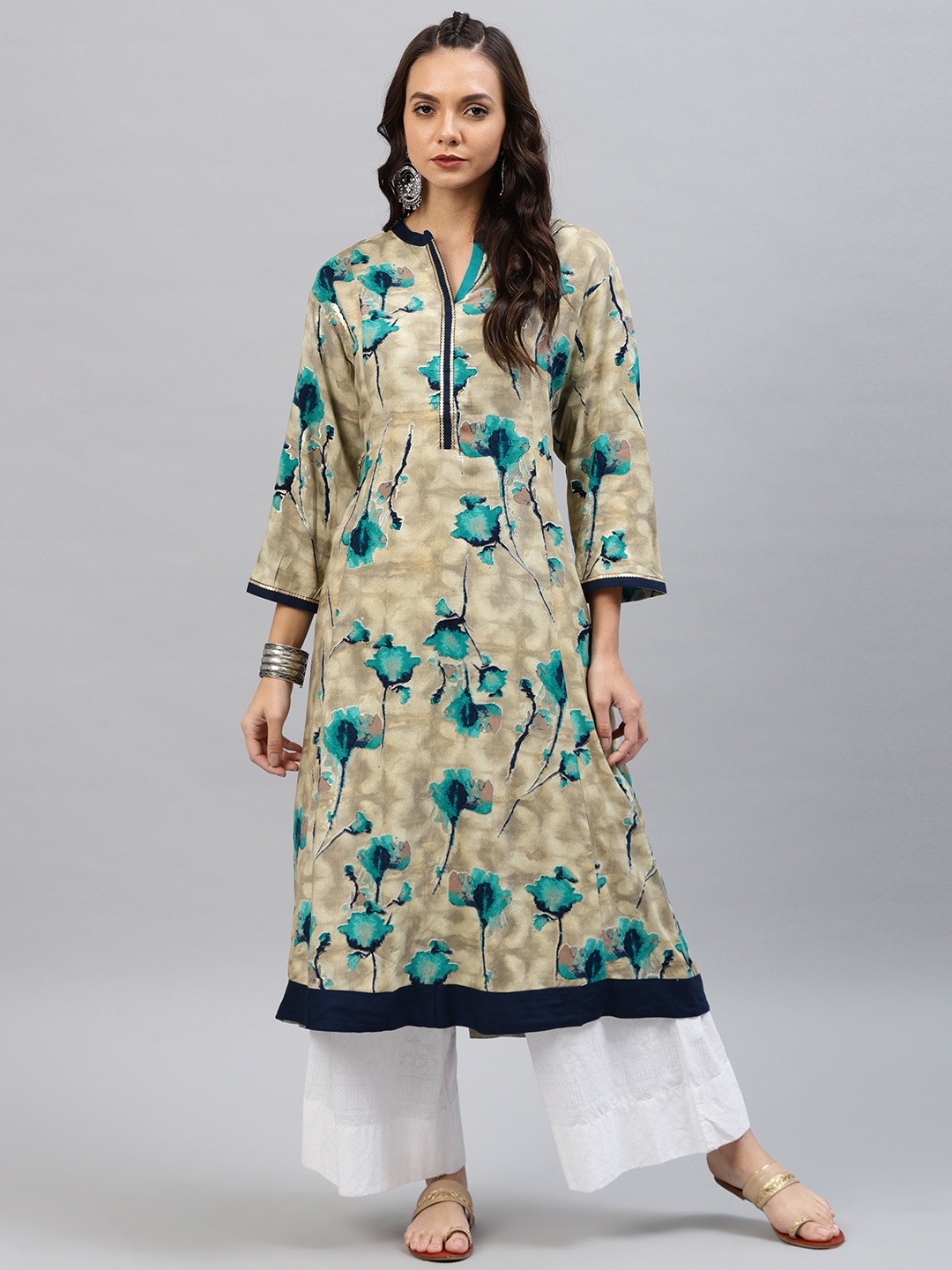 

Shree Women Beige & Teal Printed Rayon A-Line Kurta