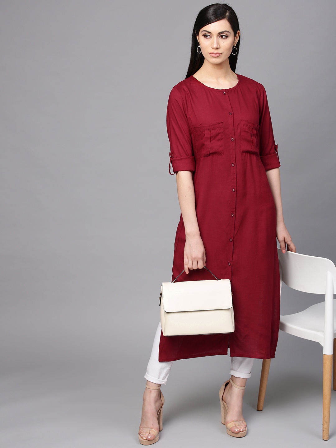 

AKS Women Maroon Solid Straight Kurta