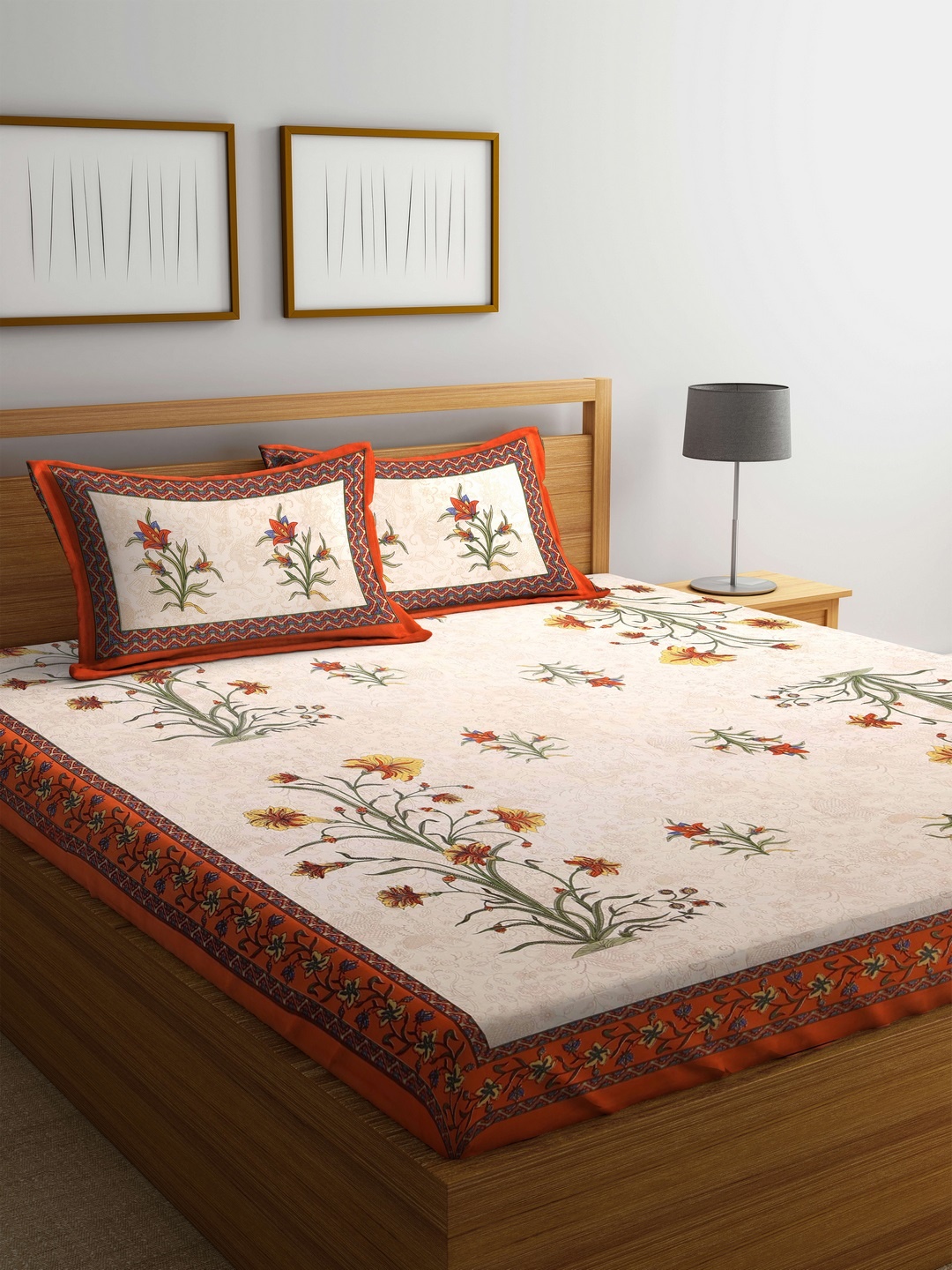 

Rajasthan Decor Beige & Orange Floral Flat 144 TC Cotton 1 King Bedsheet with 2 Pillow Covers