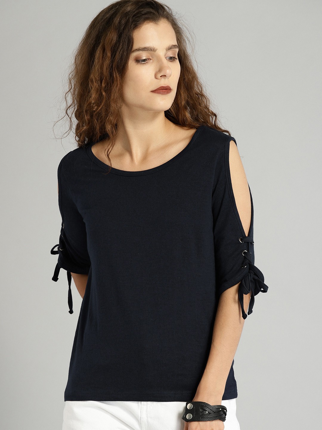 

Roadster Women Navy Blue Solid Pure Cotton Top