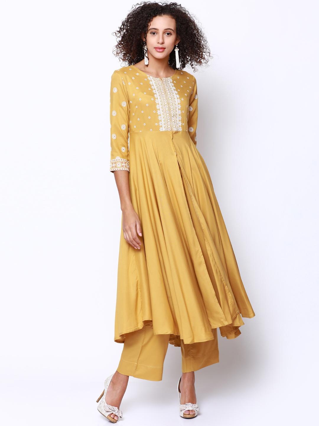 

Vishudh Women Mustard & Solid Kurta with Trousers