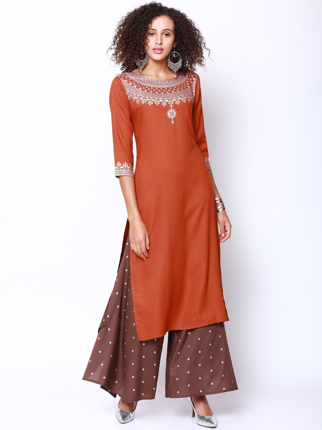

Vishudh Women Rust & Brown Solid Kurta with Palazzos