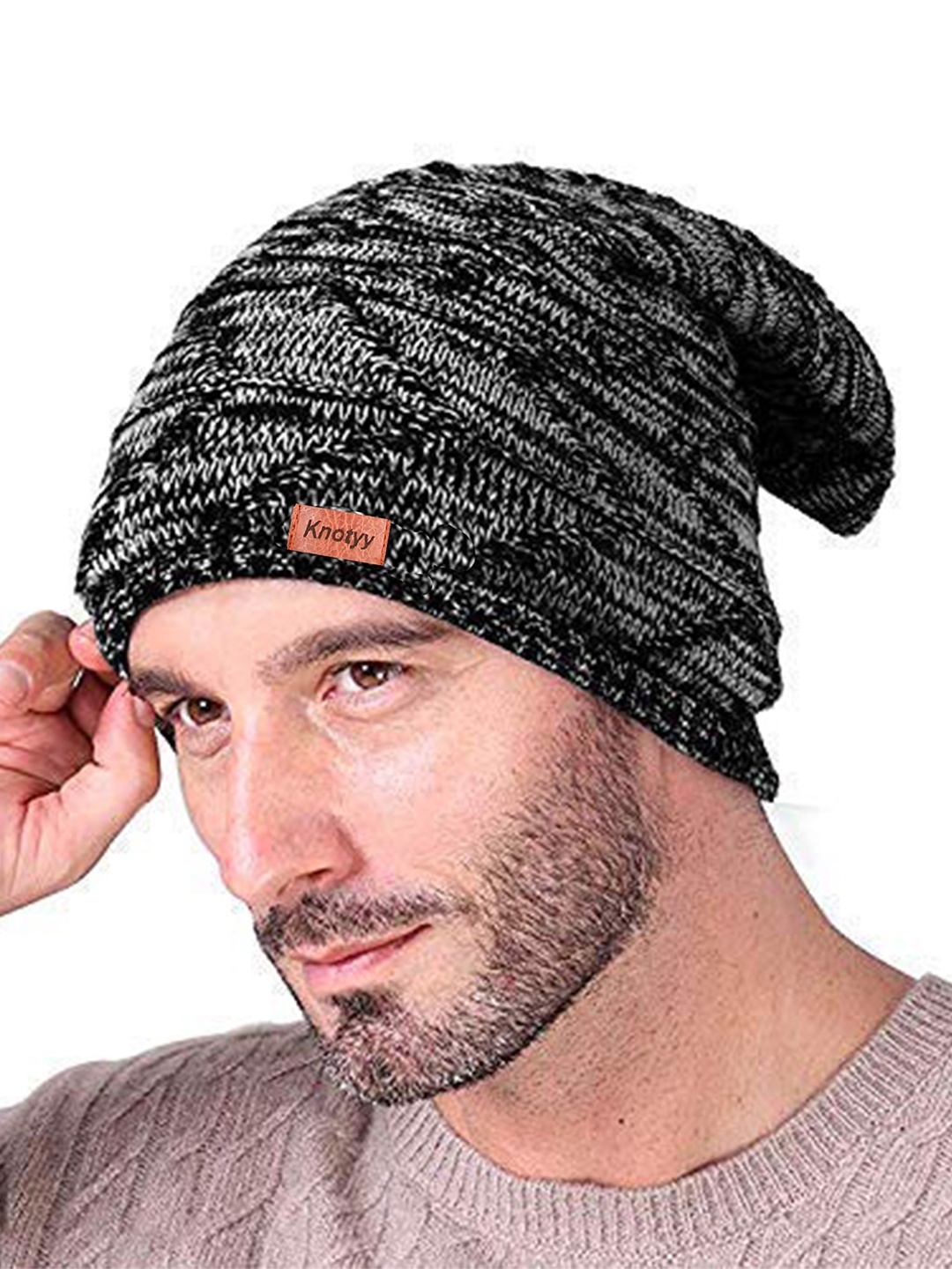 

Knotyy Unisex Black & Off-White Self Design Beanie