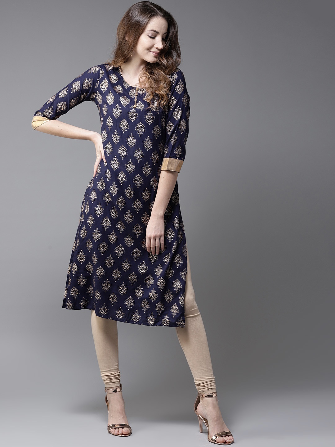 

Moda Rapido Women Navy Blue & Golden Printed Straight Kurta