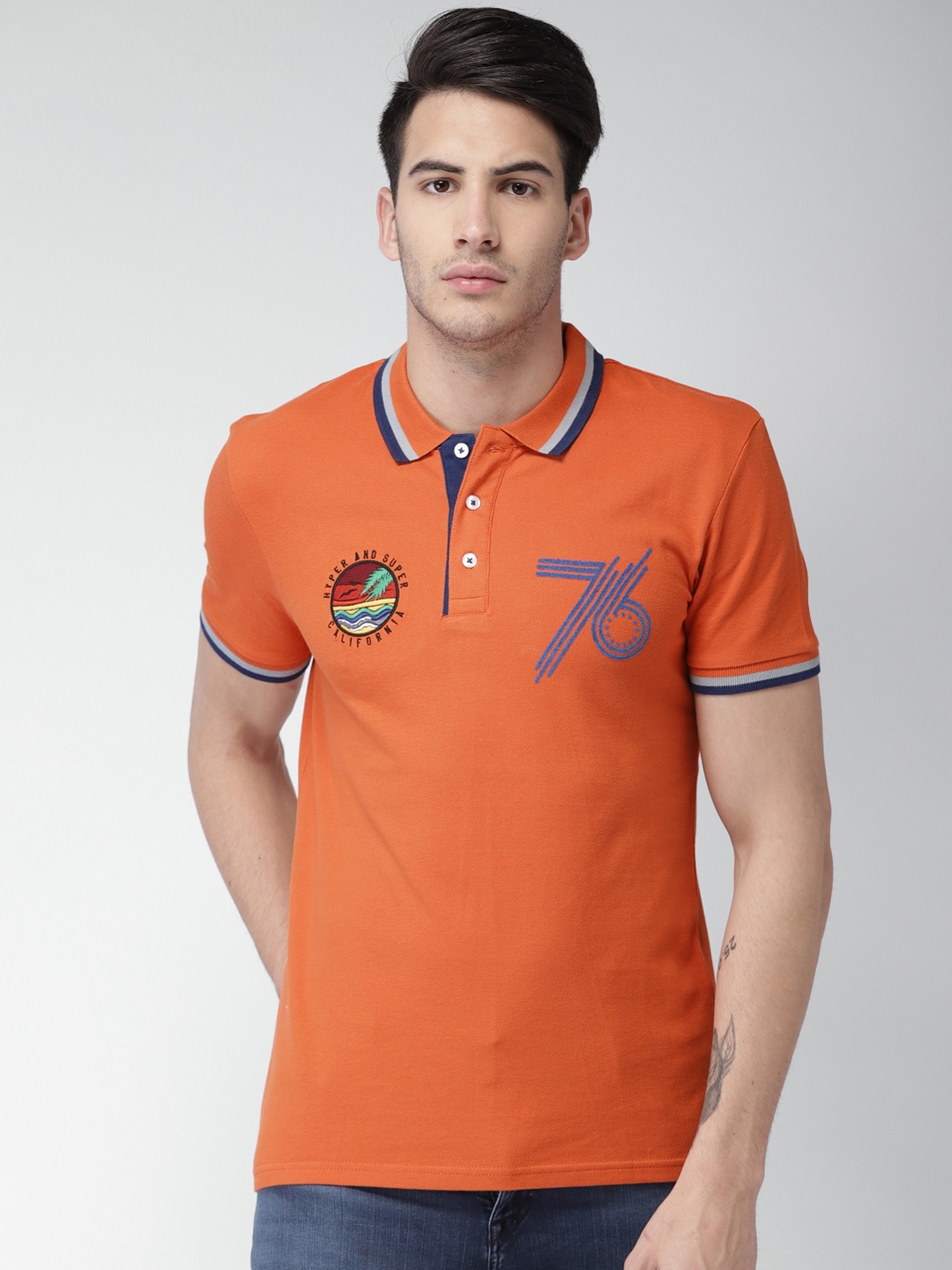 

Celio Men Orange Solid Polo Collar T-shirt