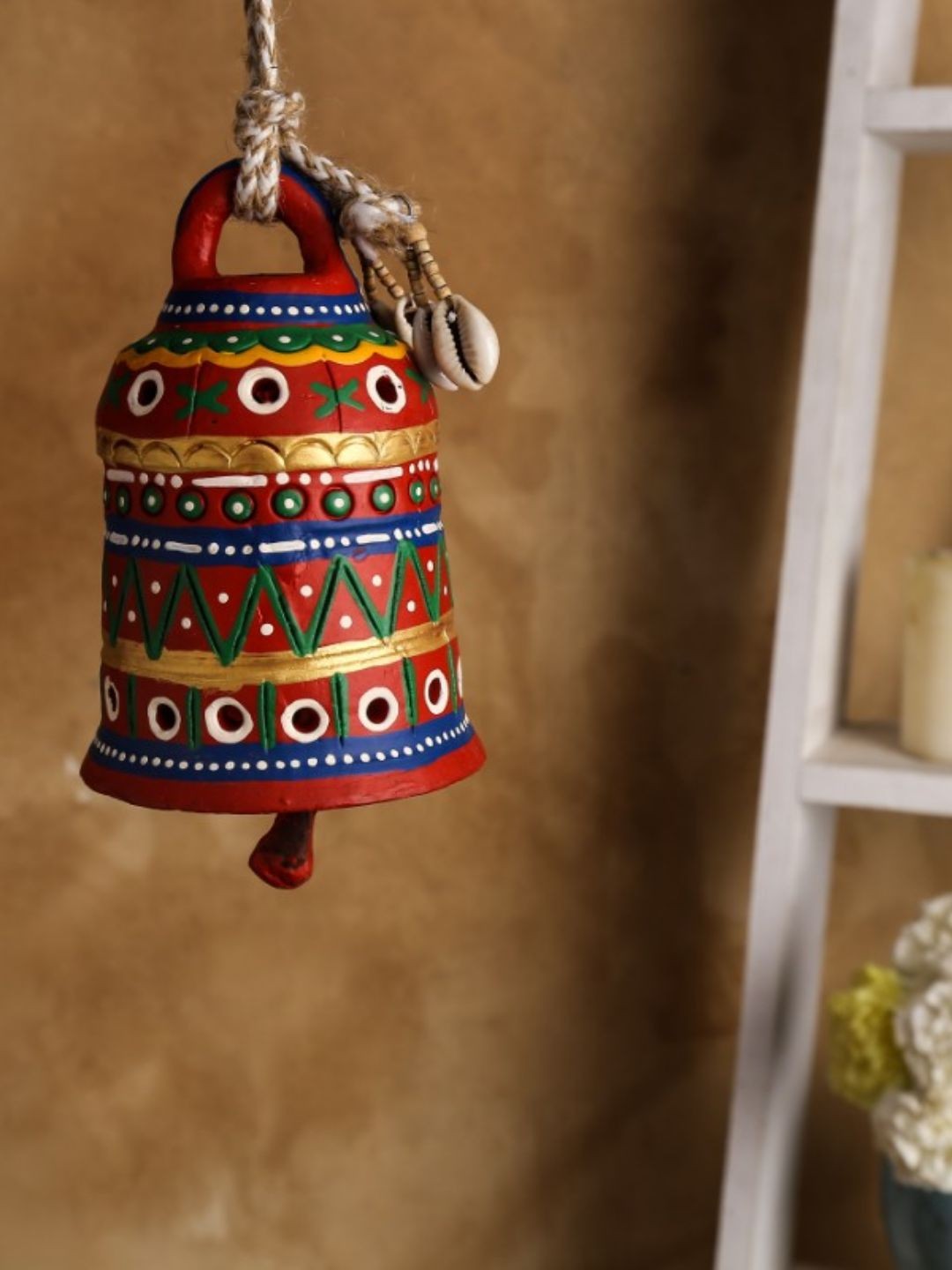

Unravel India Warli Red Hand Painted Teracotta Hanging Bell