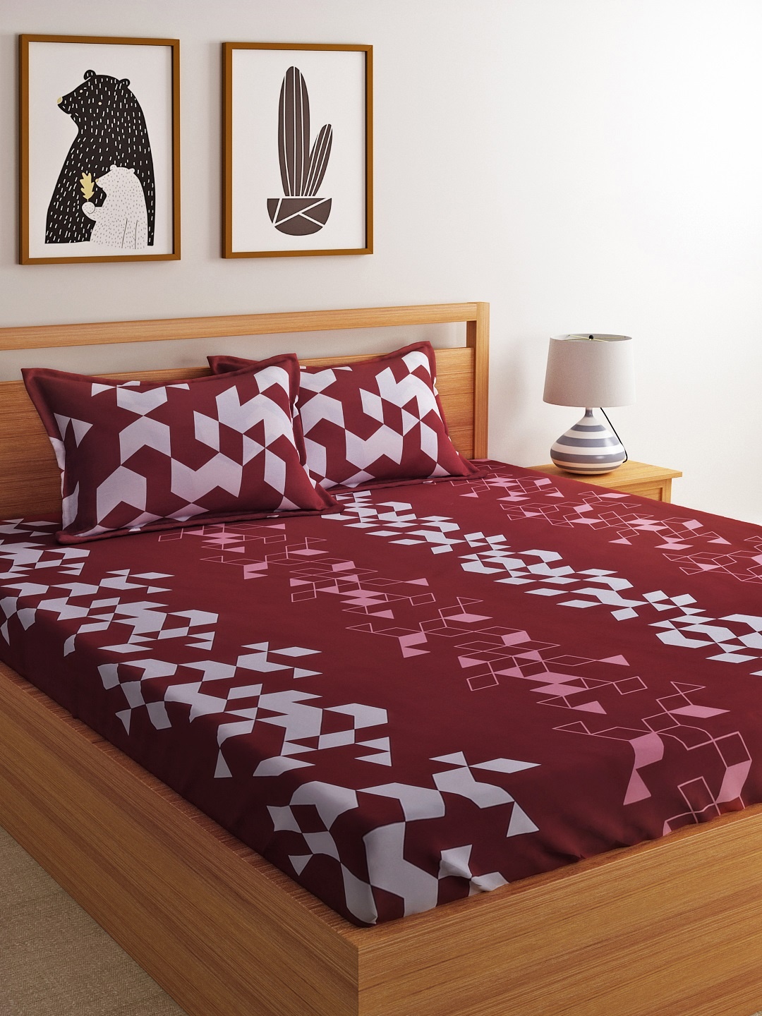

Dreamscape Maroon Geometric Flat 144 TC 1 Double Queen Bedsheet with 2 Pillow Covers