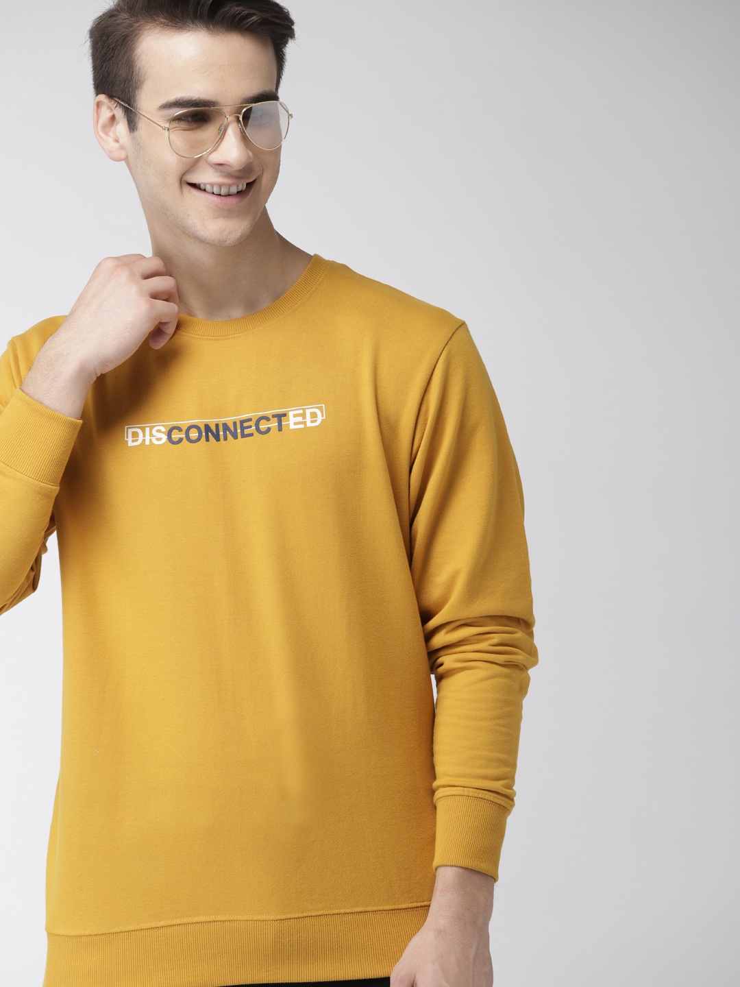 

Mast & Harbour Men Mustard Yellow Solid Sweatshirt