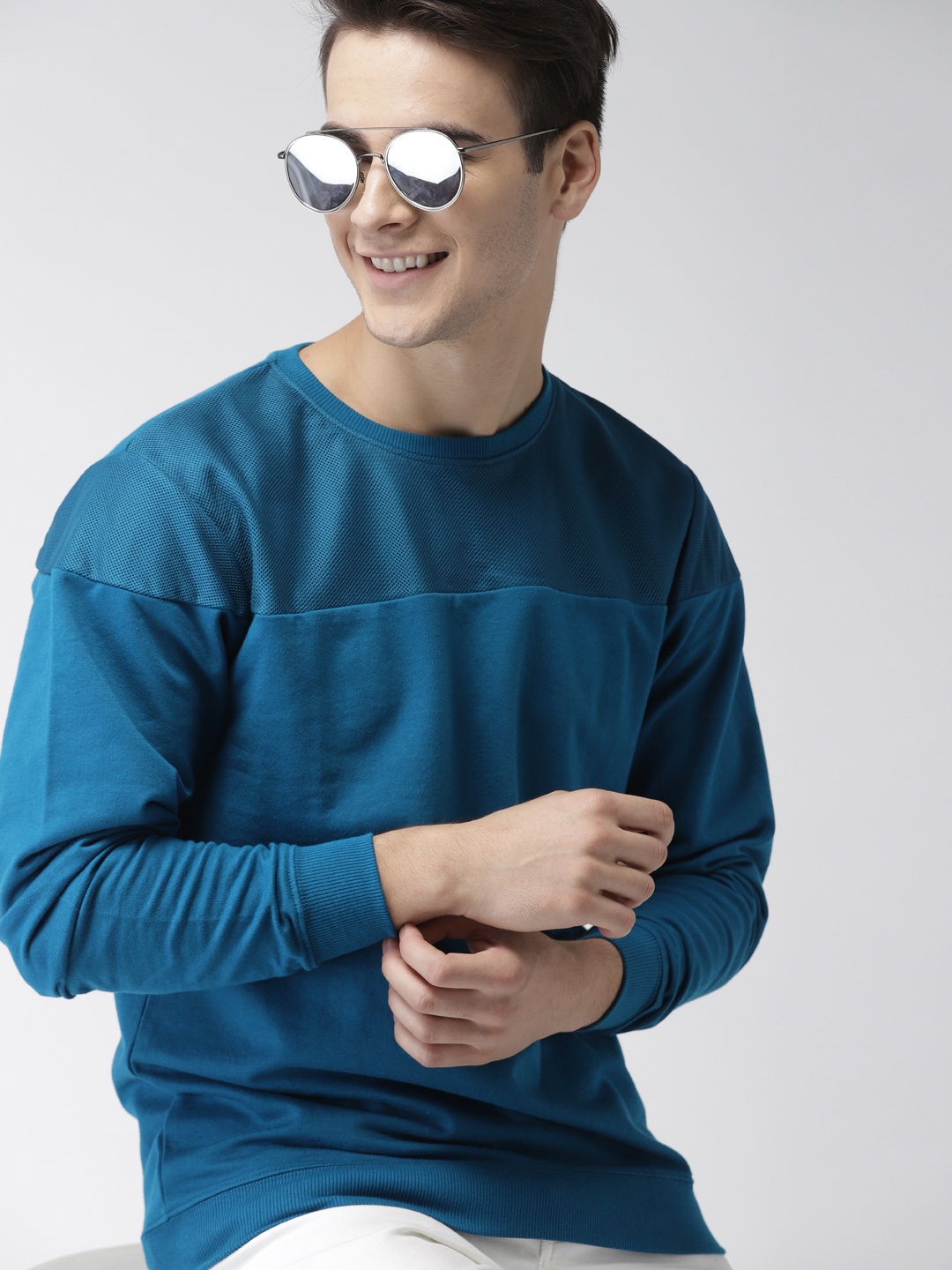 

Mast & Harbour Men Blue Solid Sweatshirt