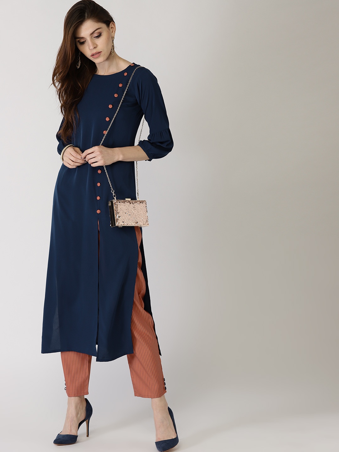 

Libas Women Navy Blue & Rust Orange Solid Kurta with Trousers