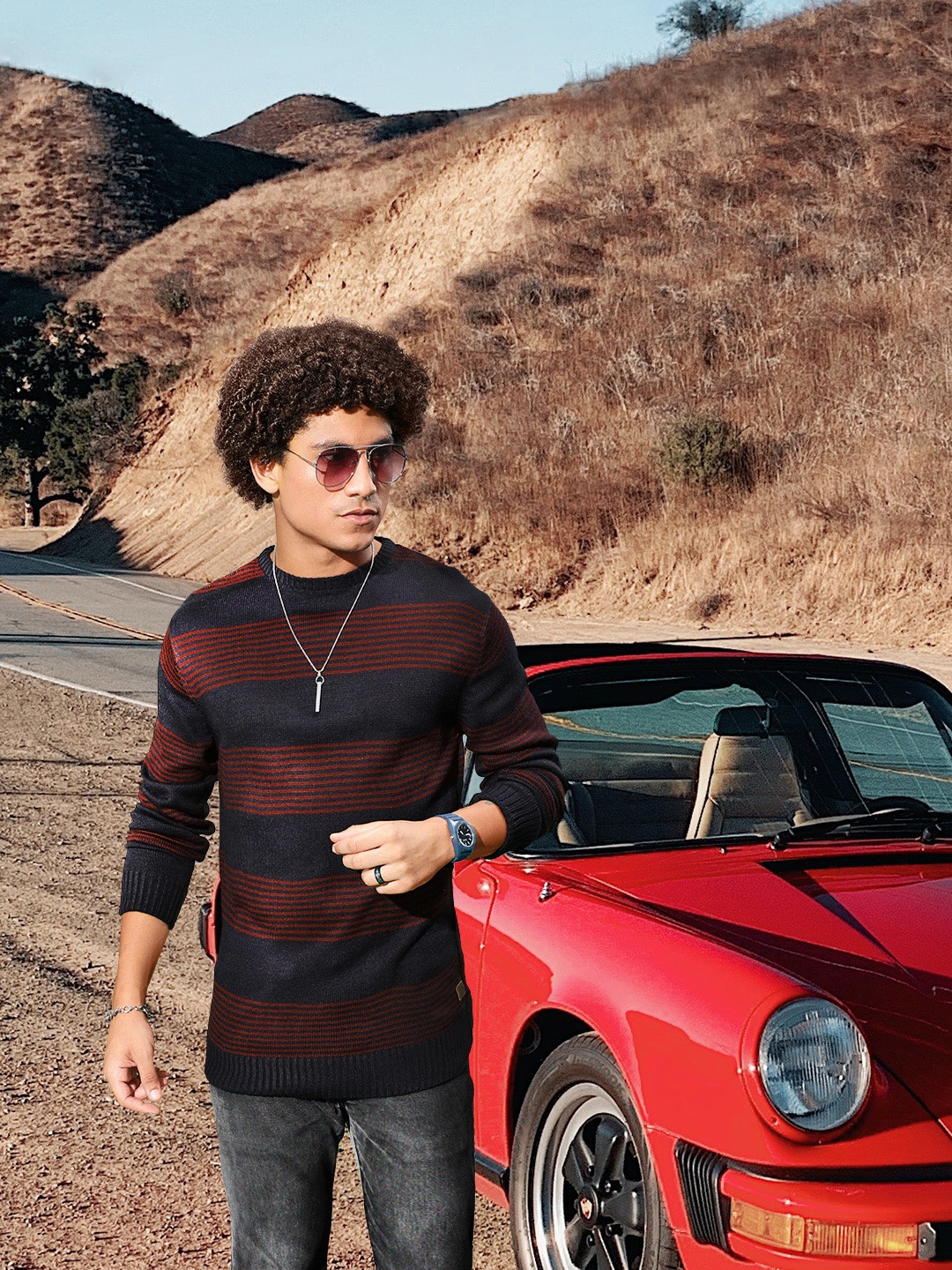 

Roadster Men Navy Blue & Maroon Striped Pullover