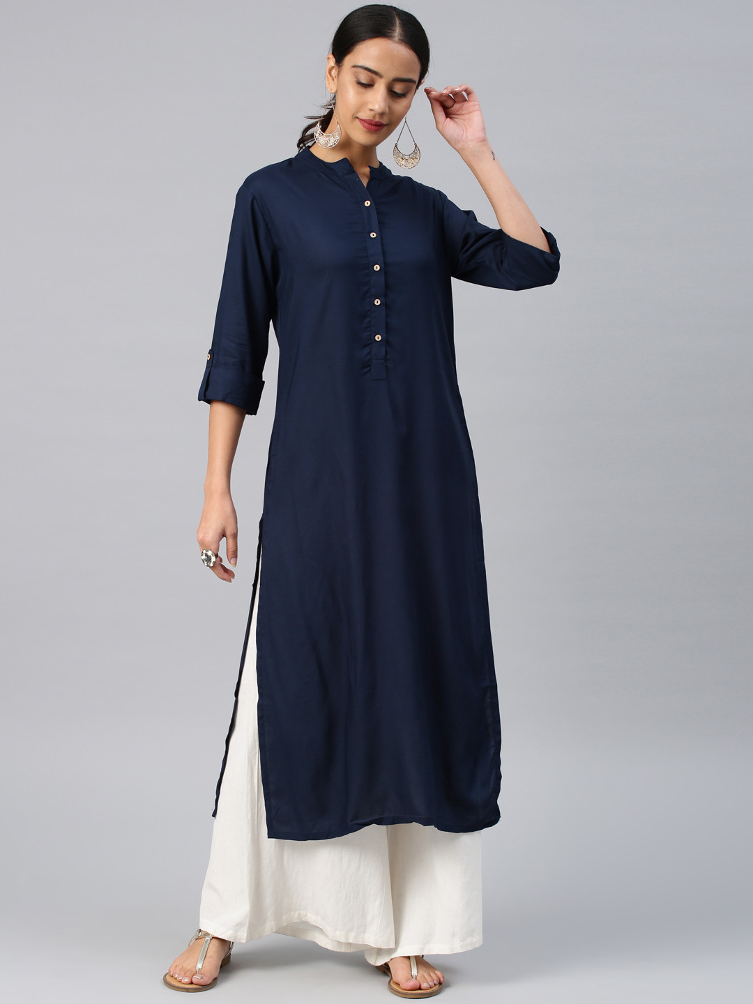 

Vishudh Women Navy Blue Solid Straight Kurta