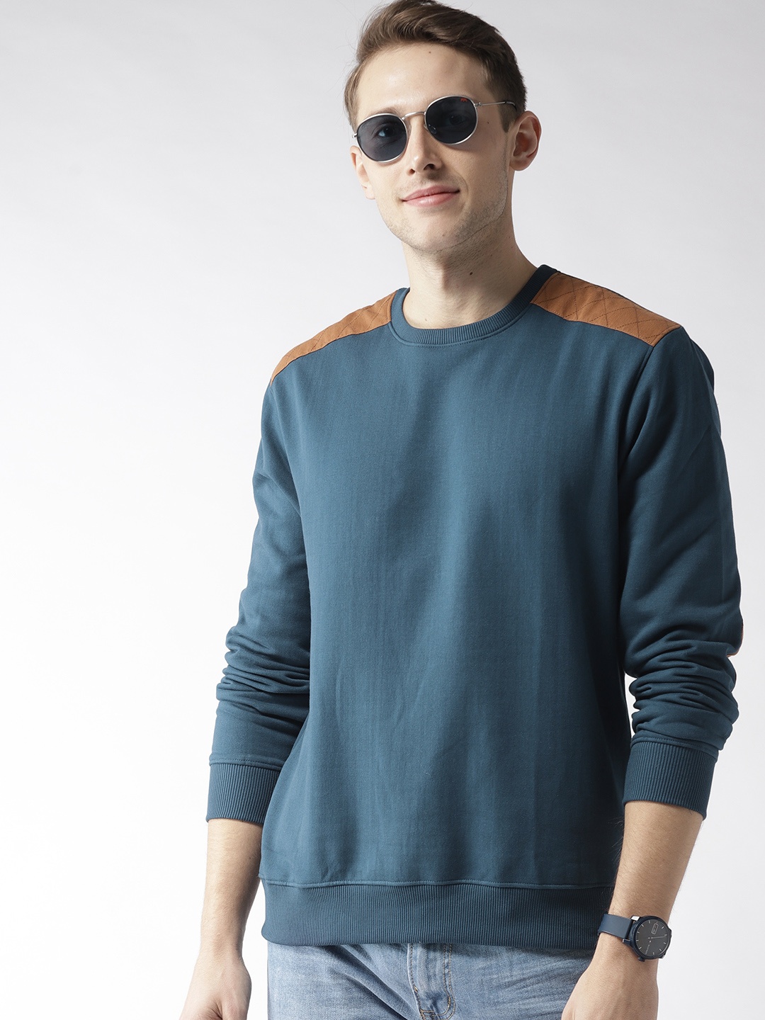 

Mast & Harbour Men Teal Blue Solid Sweatshirt