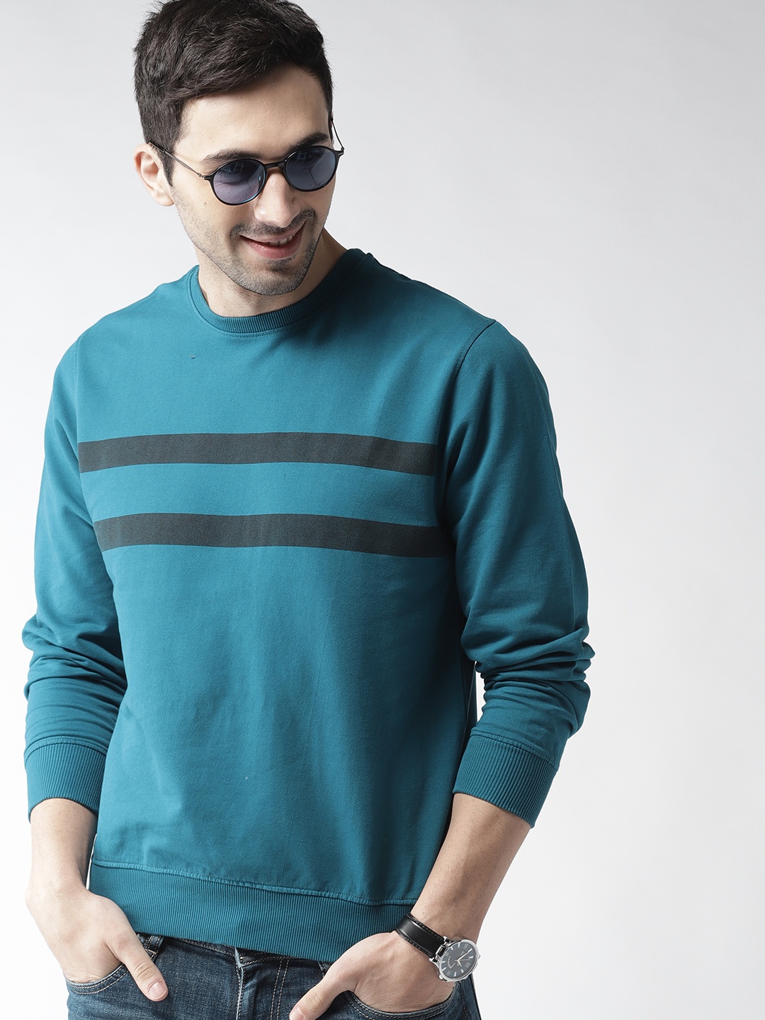 

Mast & Harbour Men Teal Blue Solid Sweatshirt