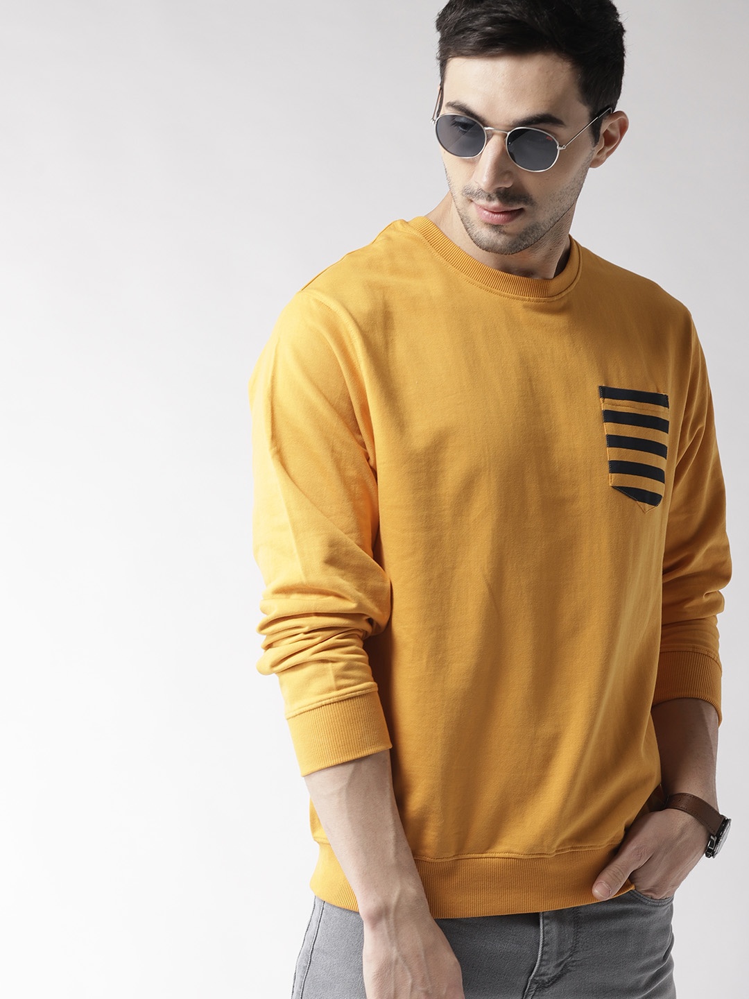 

Mast & Harbour Men Mustard Yellow Solid Sweatshirt