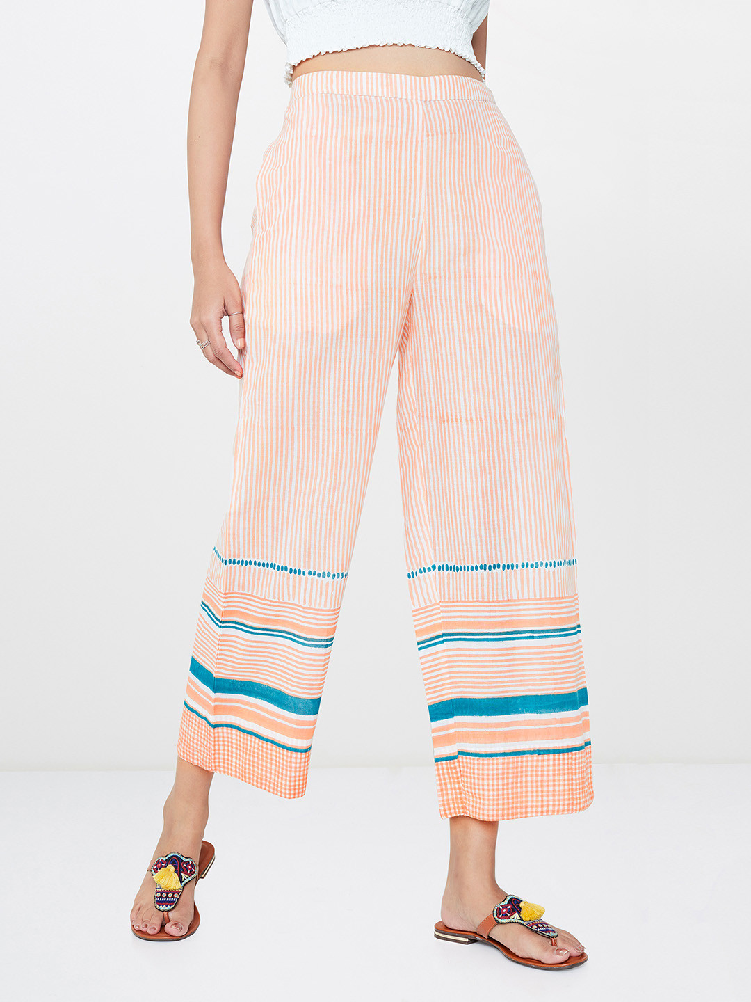 

Global Desi Women Peach-Coloured Relaxed Straight Leg Straight Fit Striped Regular Trousers