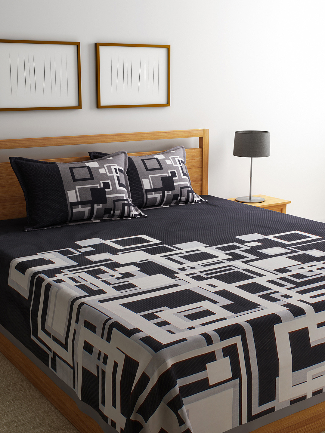 

Romee Black & White Reversible Bed Cover with 2 Pillow Covers
