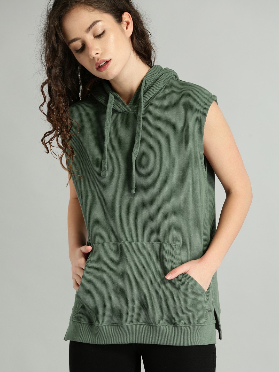 

Roadster Women Olive Green Solid Hooded Sweatshirt