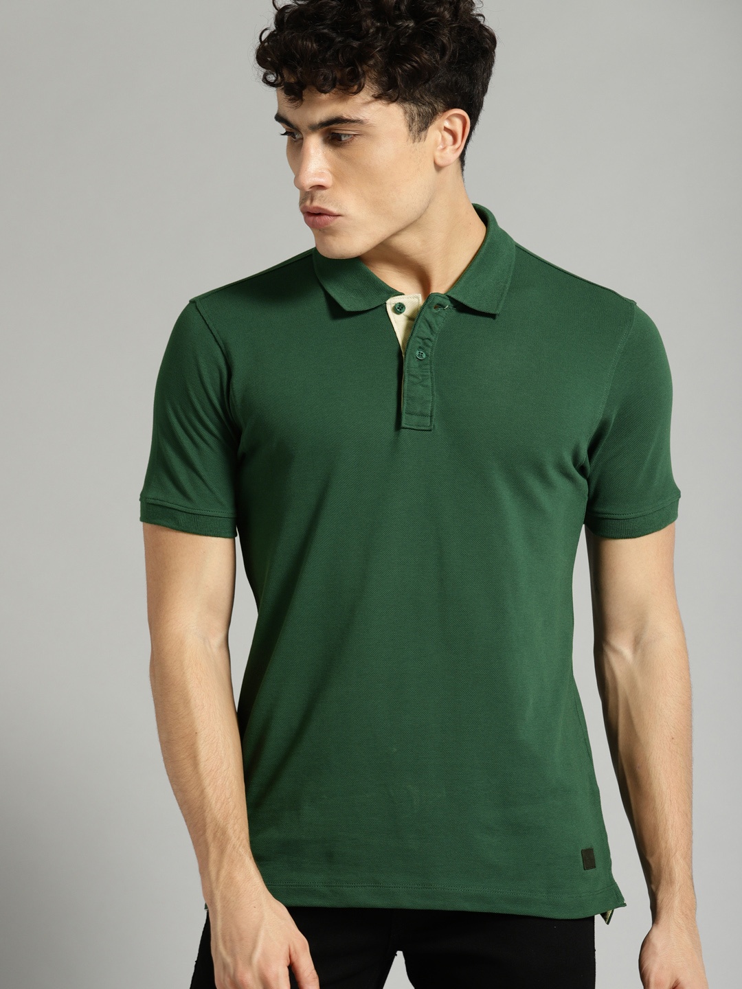 

Roadster Men Green Solid Polo Collar Pure Cotton T-shirt