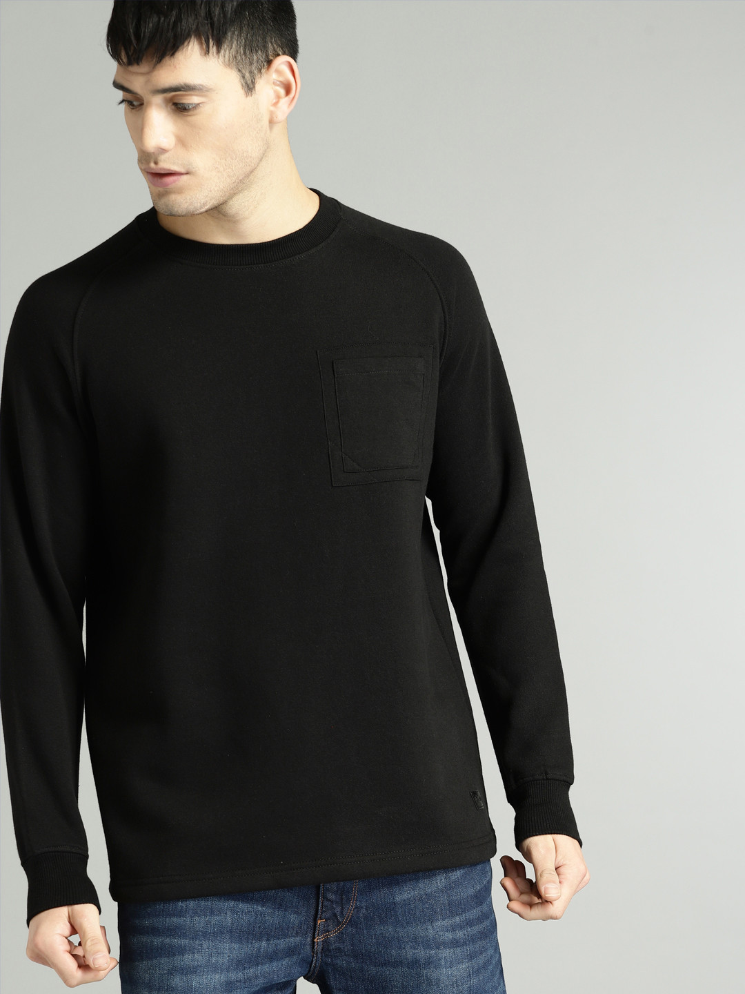 

Roadster Men Black Solid Sweatshirt