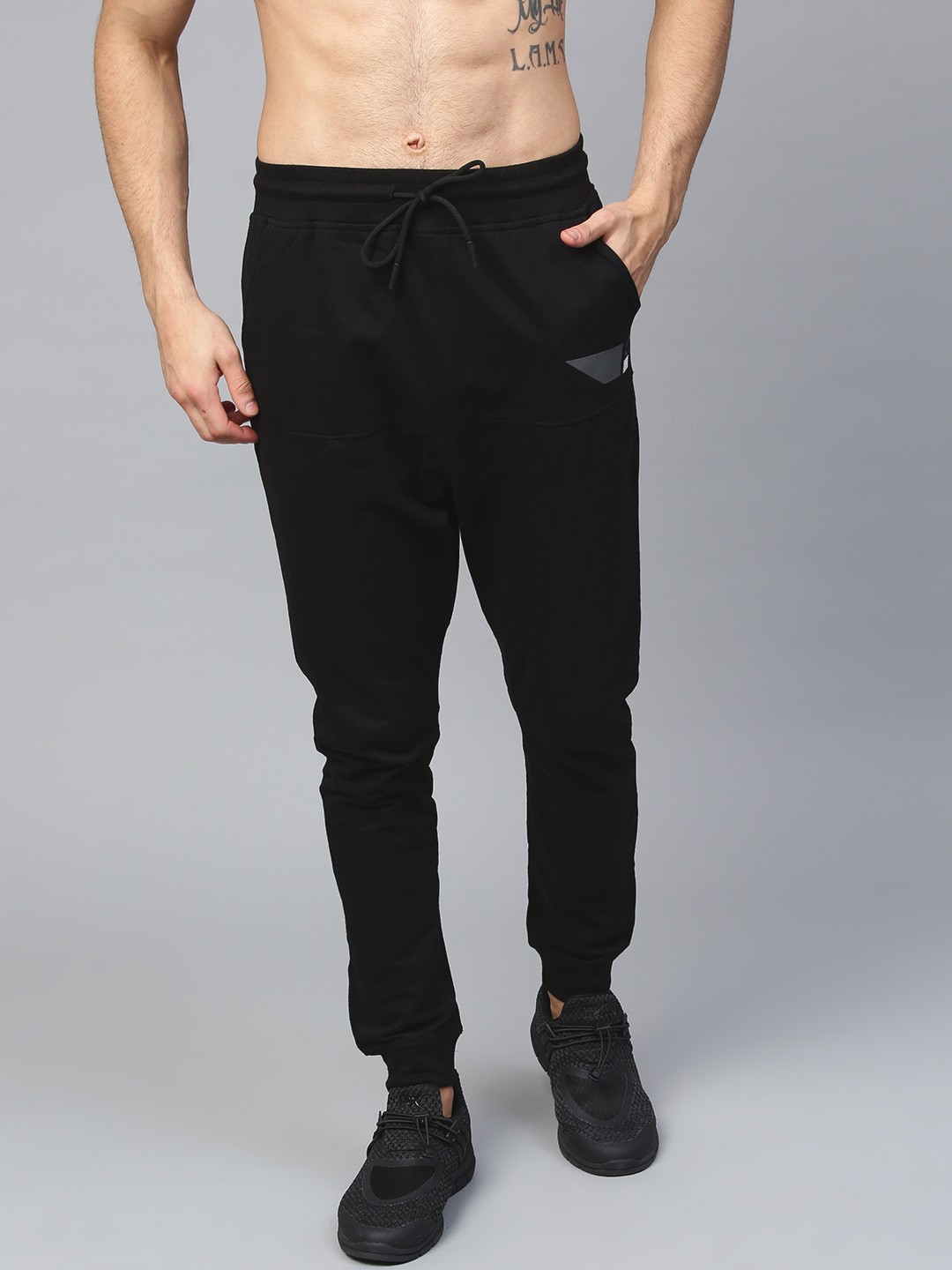

HRX by Hrithik Roshan Men Black Solid Joggers