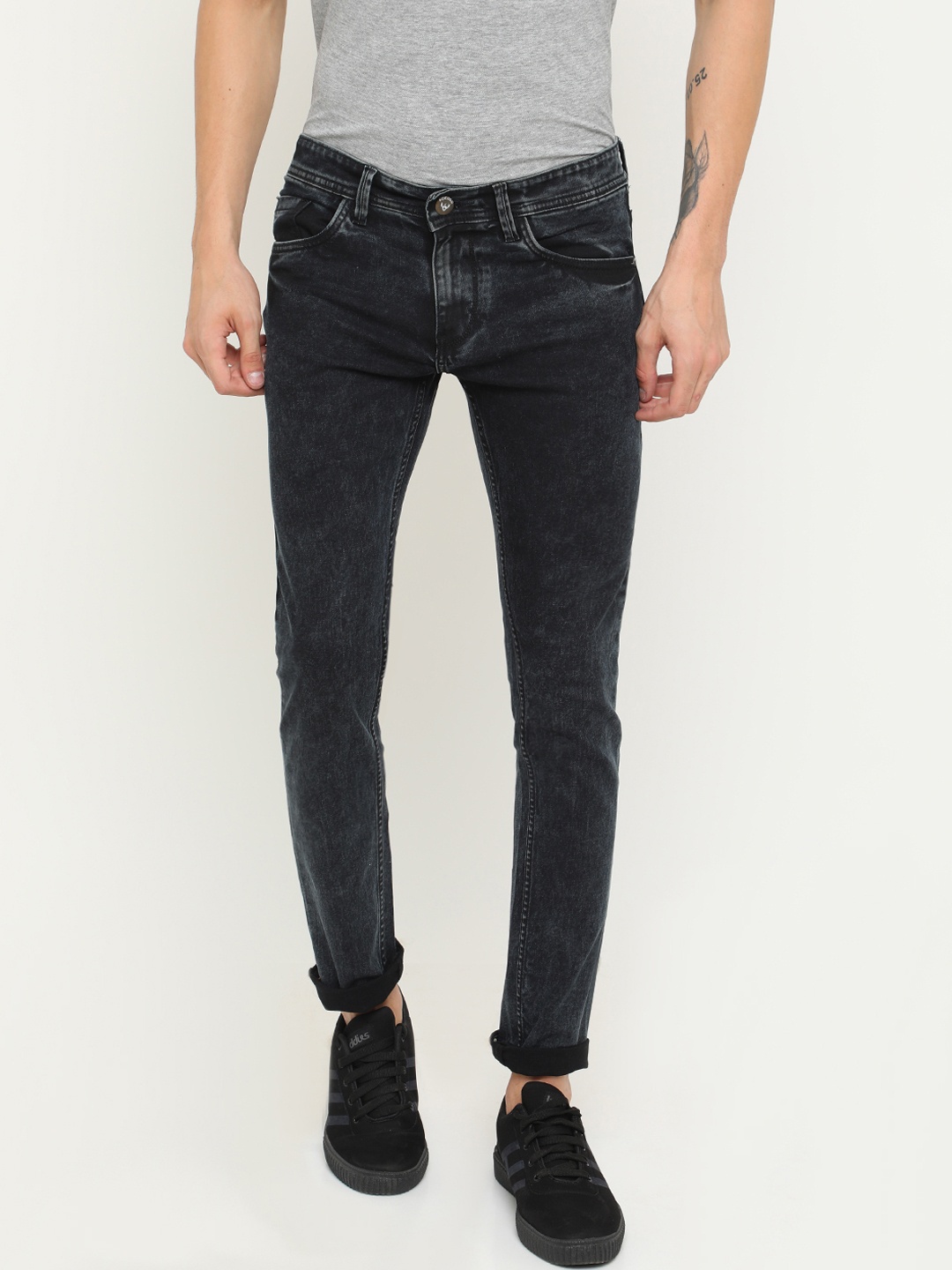 

FOCOSO Men Black Slim Fit Mid-Rise Clean Look Stretchable Jeans