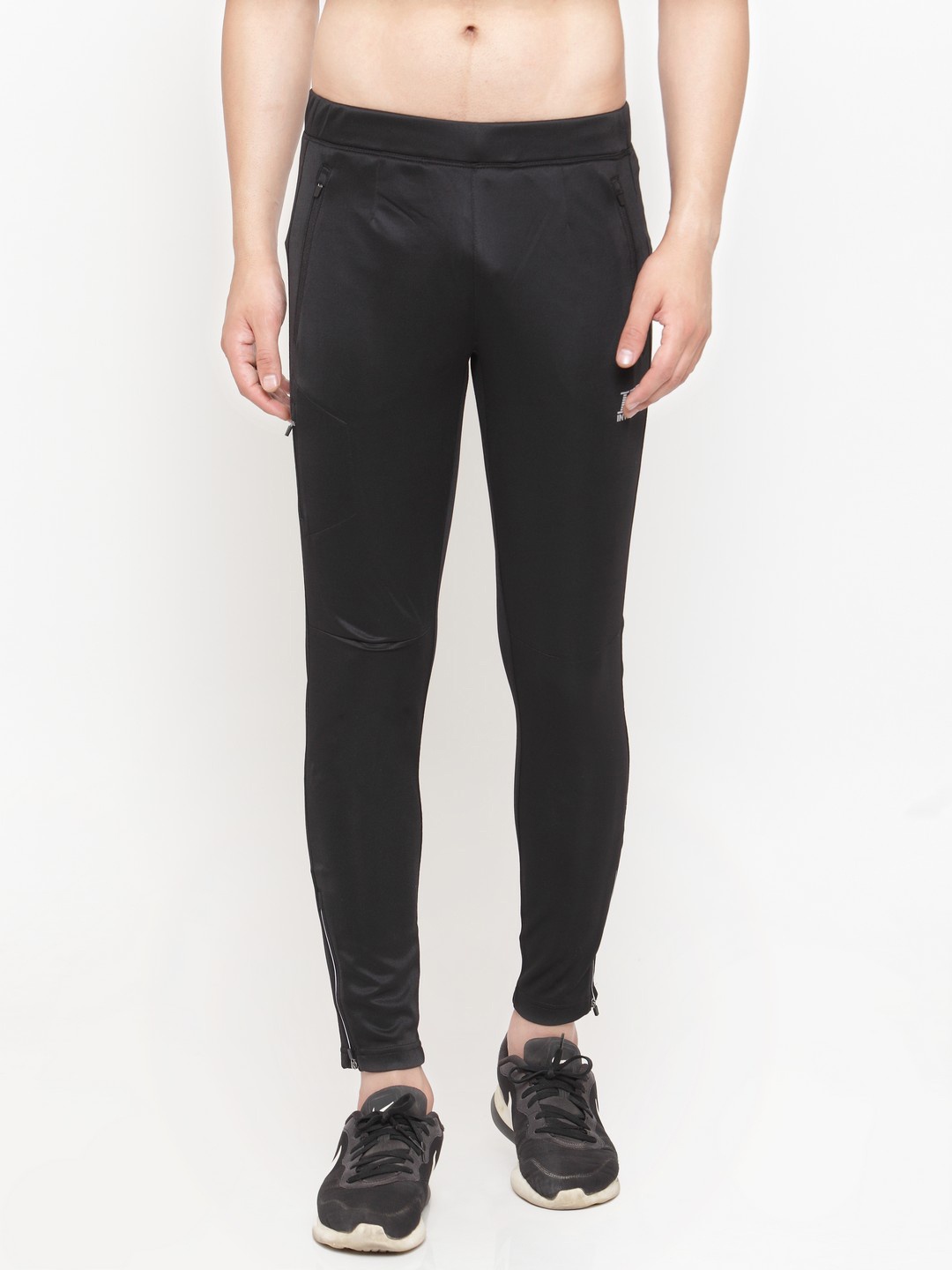 

Invincible Men Black Solid Trackpants