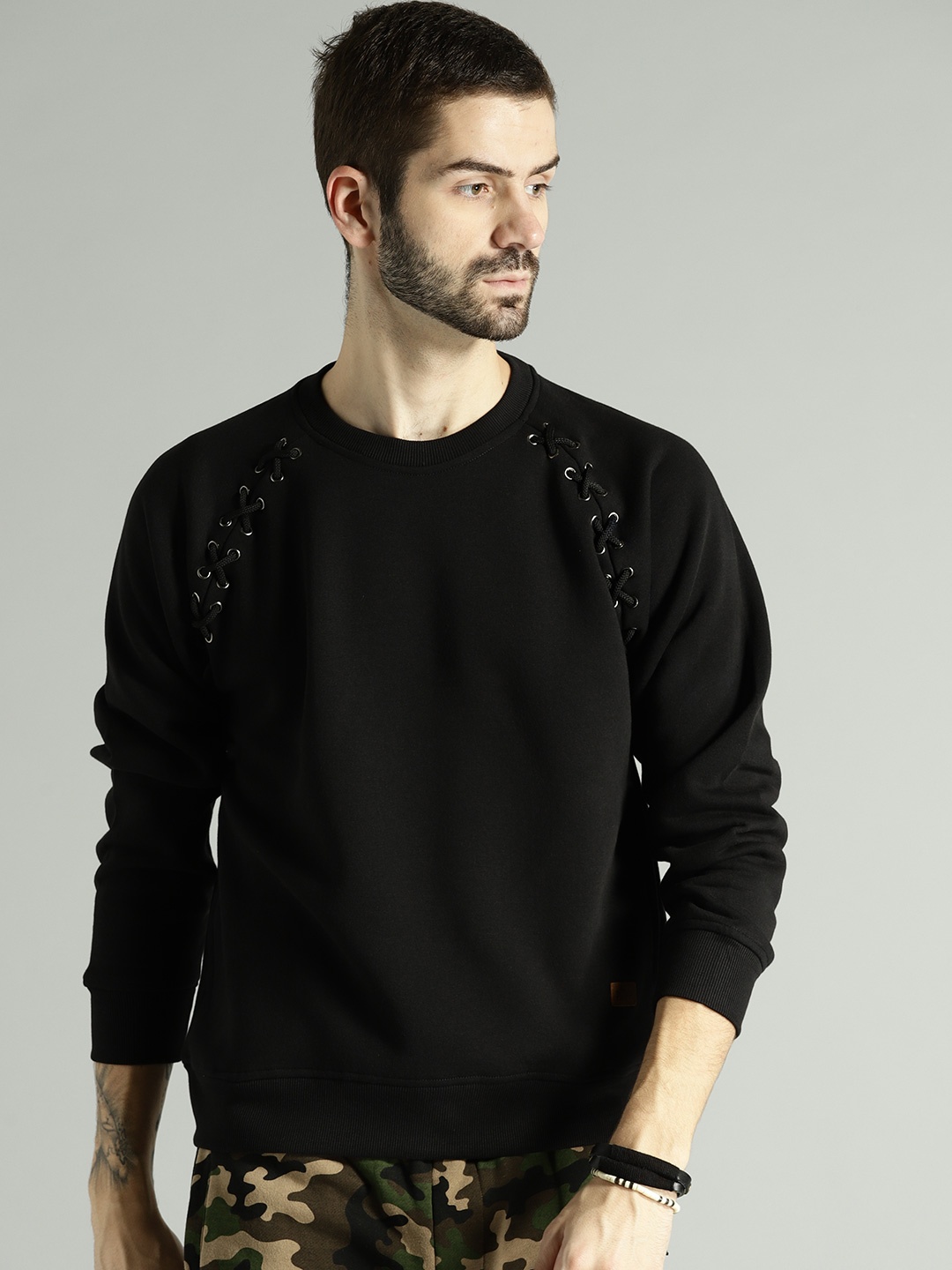 

Roadster Men Black Solid Sweatshirt