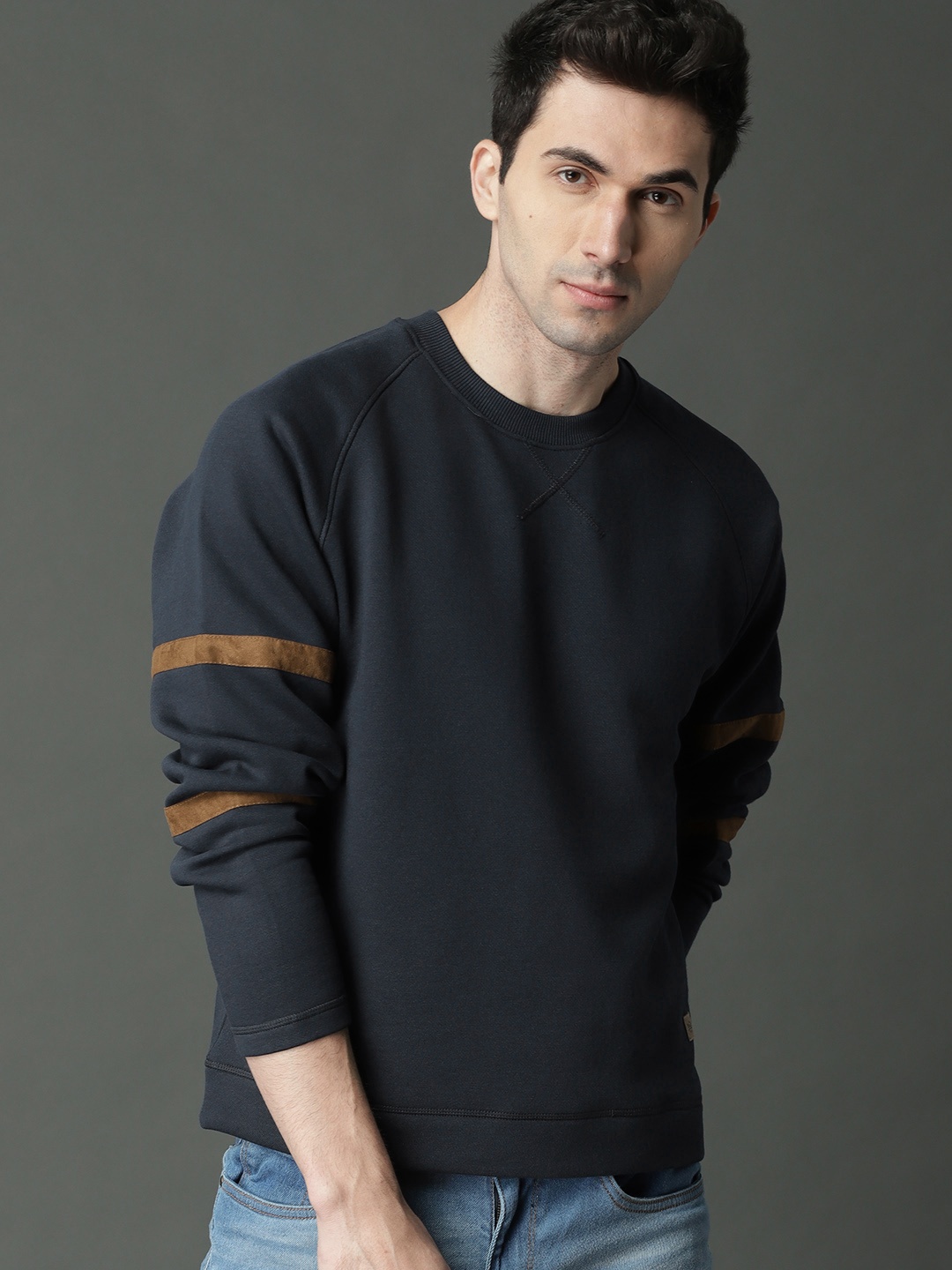 

Roadster Men Navy Blue Solid Sweatshirt
