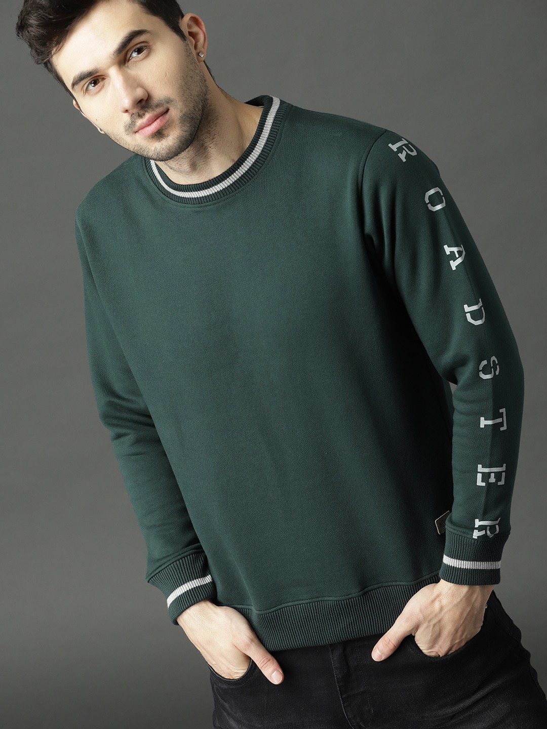 

Roadster Men Green Solid Sweatshirt