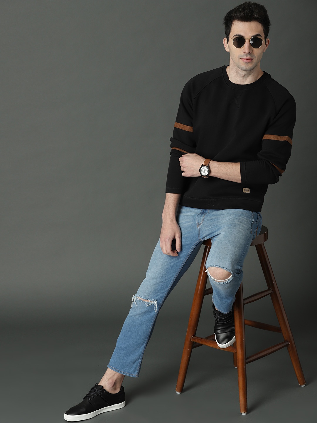 

Roadster Men Black Solid Sweatshirt