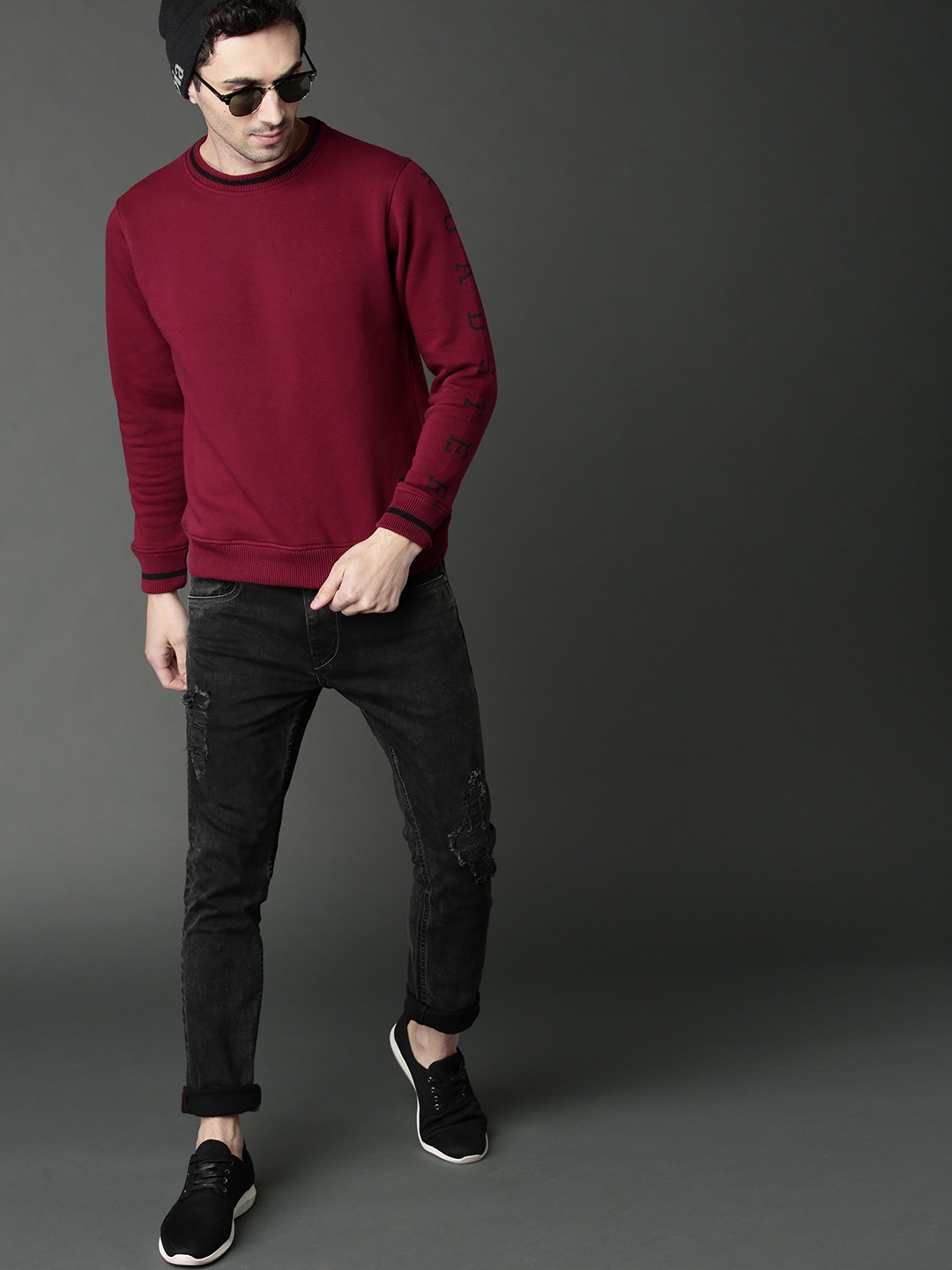 

Roadster Men Maroon Solid Sweatshirt