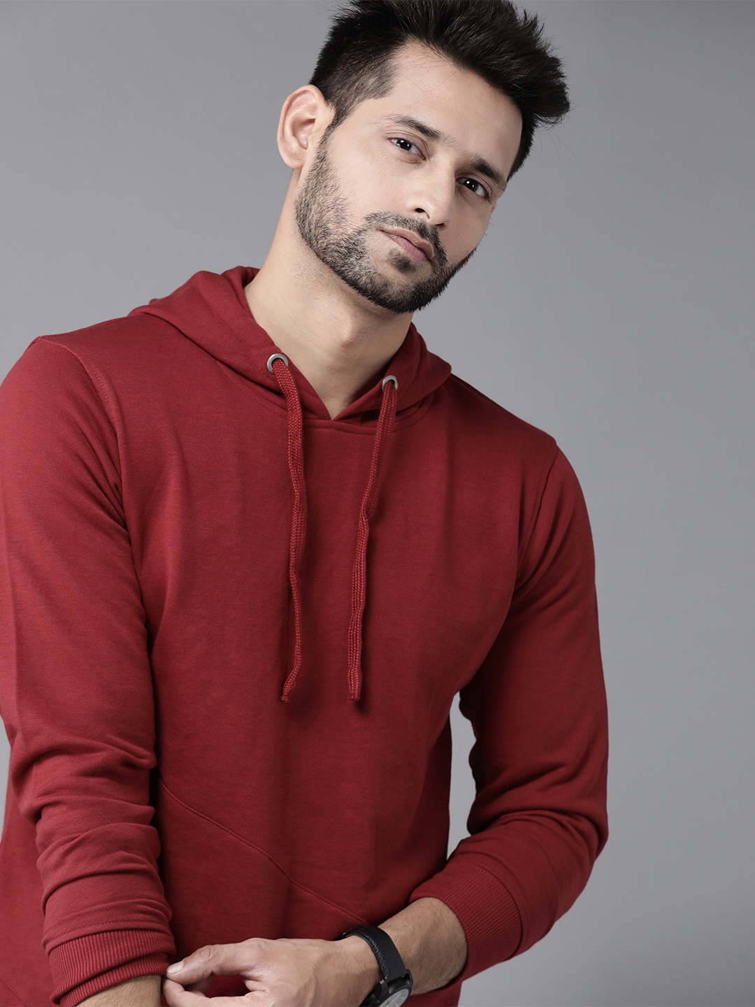 

Roadster Men Maroon Solid Hooded Sweatshirt