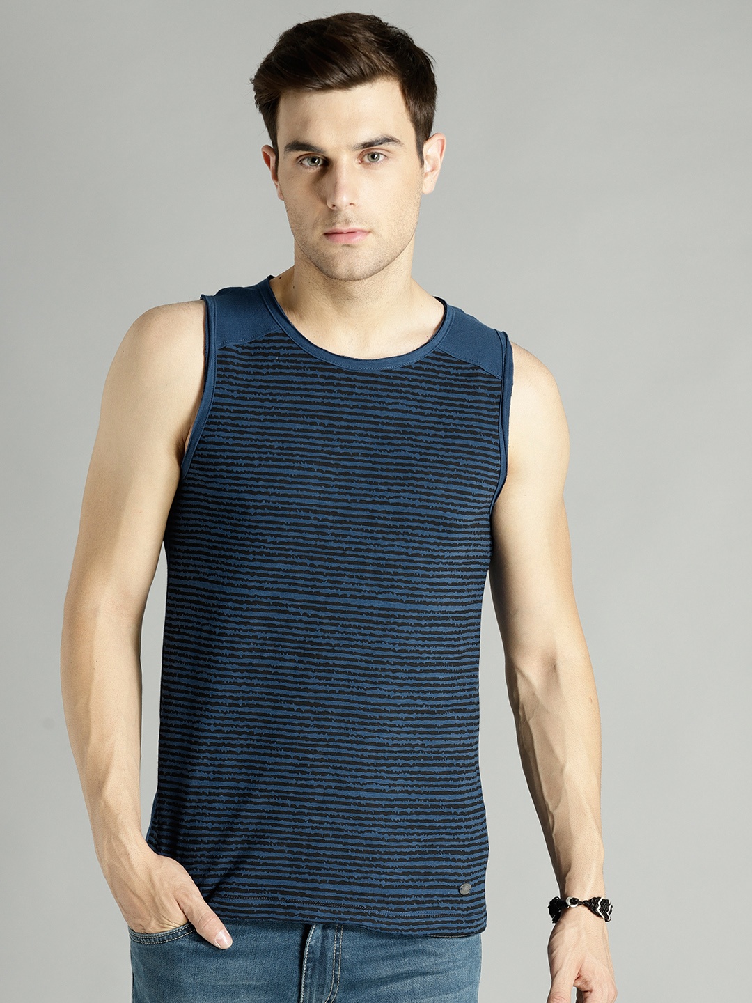 

Roadster Men Navy Blue Striped Round Neck T-shirt