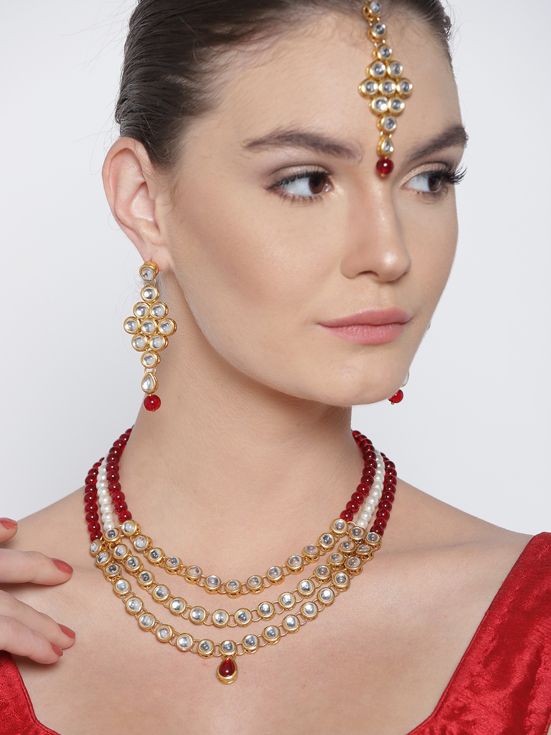 

KARATCART Maroon & Off-White Gold-Plated Kundan-Studded Handcrafted Jewellery Set