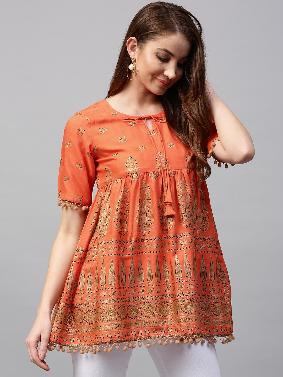 

Gerua By Libas Orange Golden Printed Empire A-Line Pure Cotton Kurti