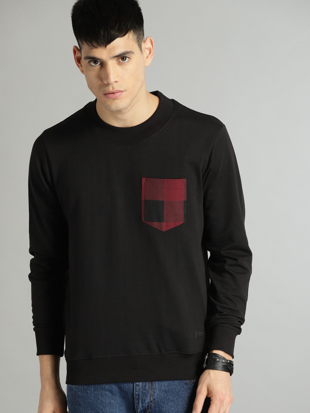 

Roadster Men Black Solid Sweatshirt