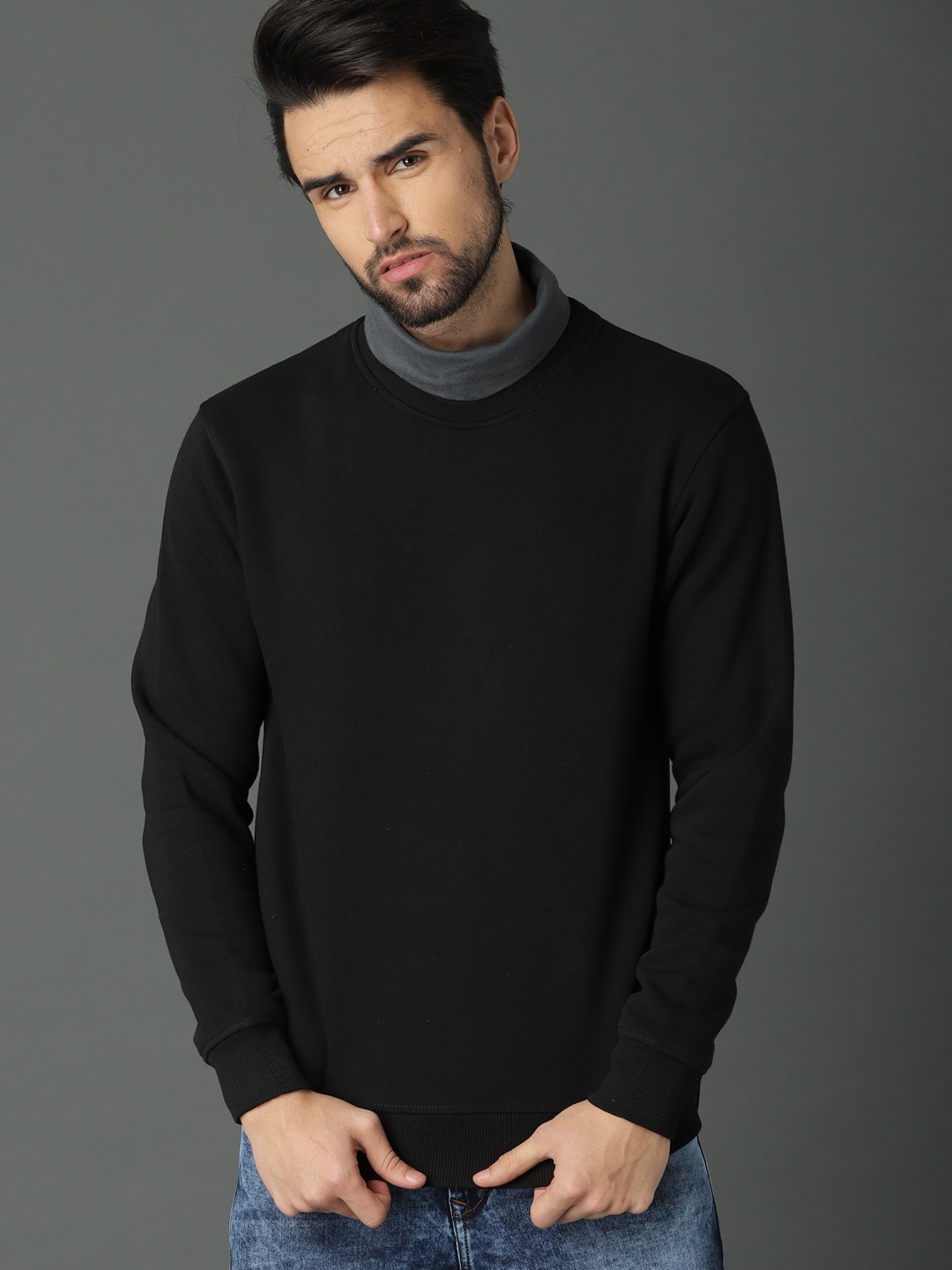 

Roadster Men Black Solid Sweatshirt