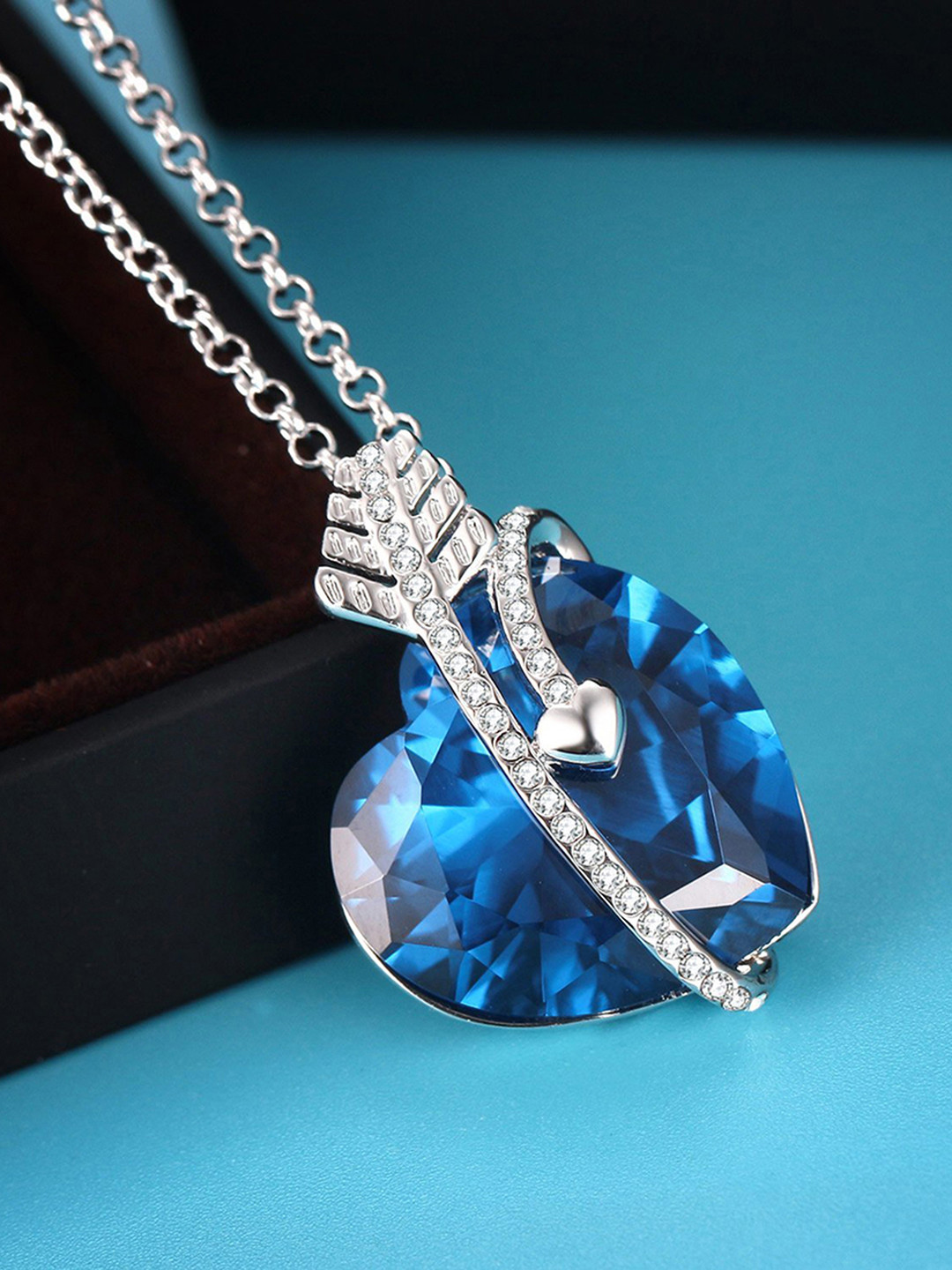 

Peora Blue & Silver-Toned Cupids Arrow Pendant With Chain