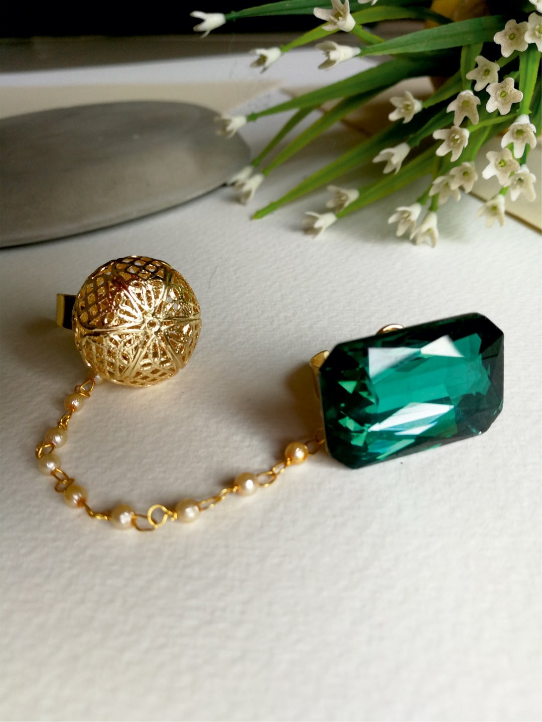 

Priyaasi Gold-Toned & Green Stone-Studded Dual Finger Adjustable Ring