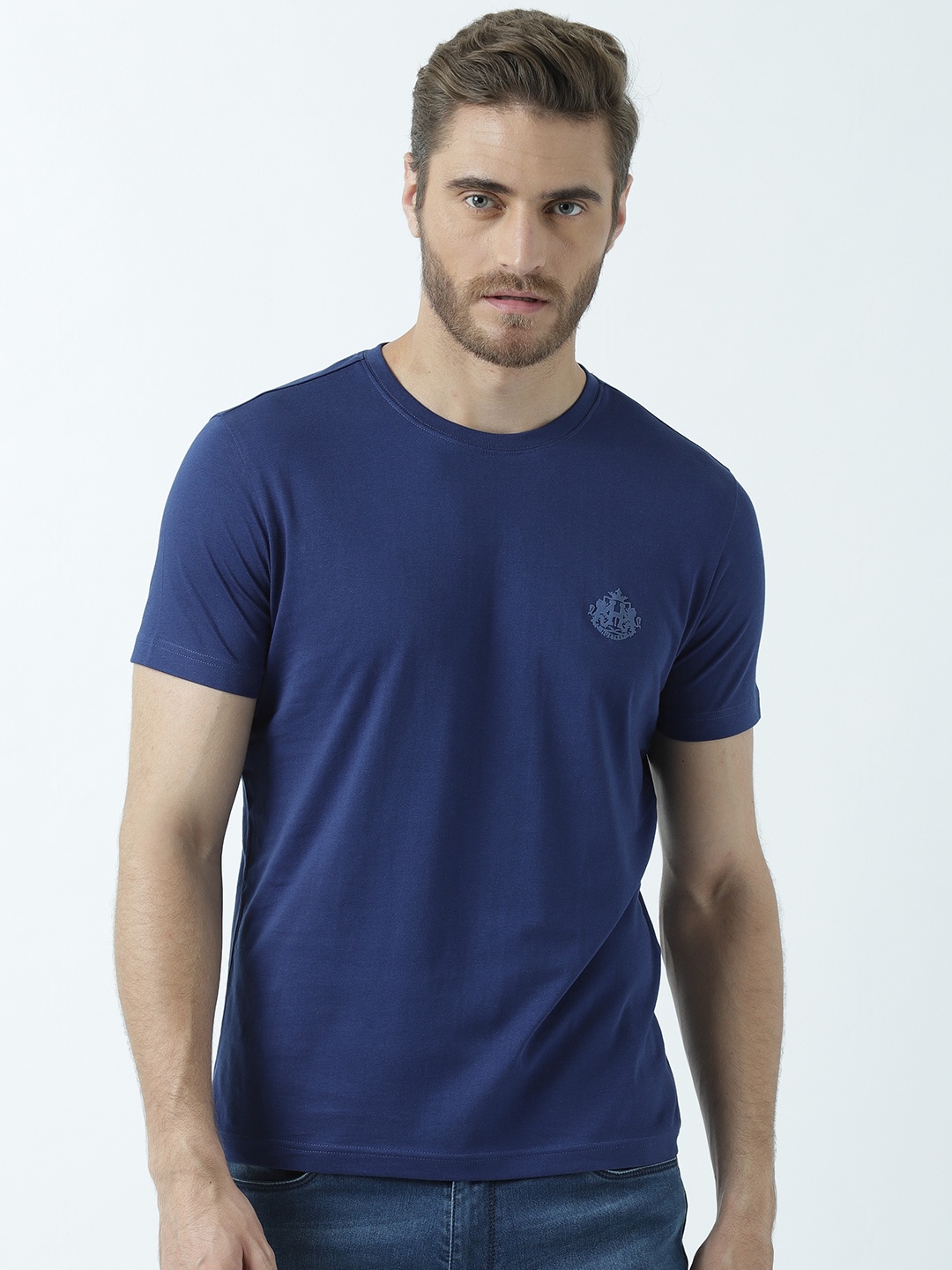 

Huetrap Men Navy Blue Solid Round Neck T-shirt
