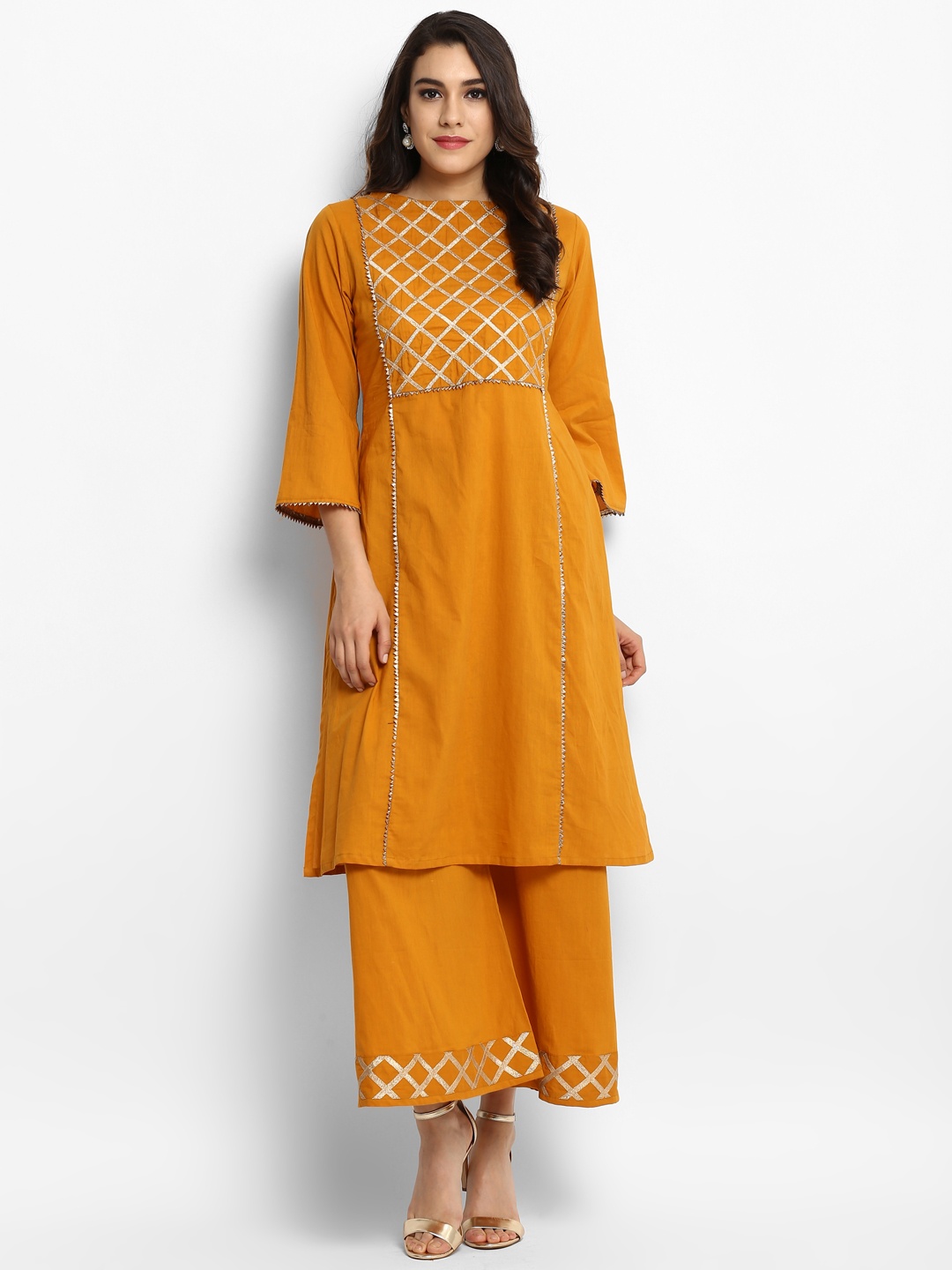 

Bhama Couture Women Yellow Embellished Kurta with Palazzos