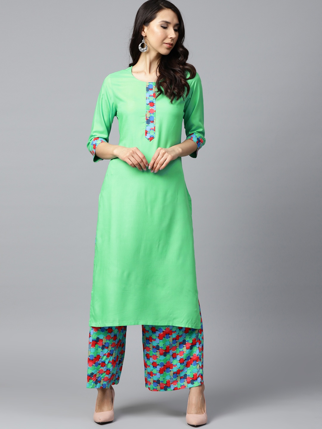 

Shree Women Green Solid Kurta with Palazzos