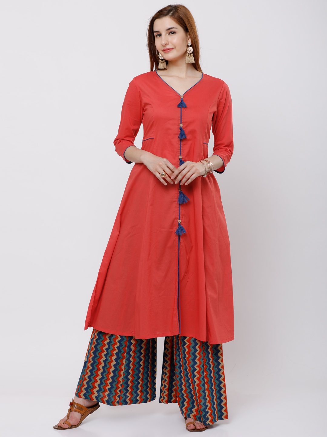 

Vishudh Women Orange Solid A-Line Kurta