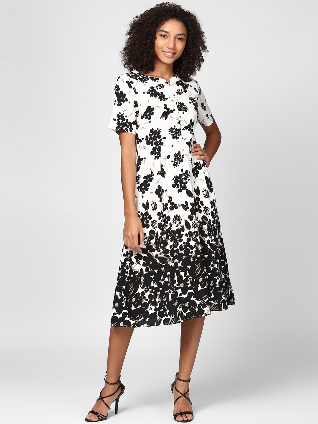 

Harpa Women White & Black Printed Fit and Flare Dress