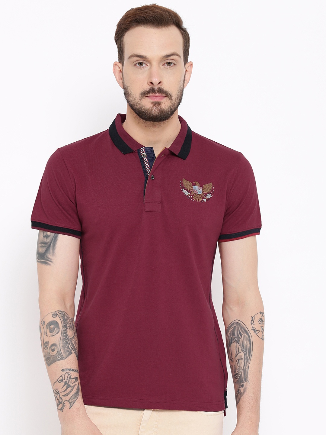 

Duke Men Maroon Solid Polo Collar T-shirt